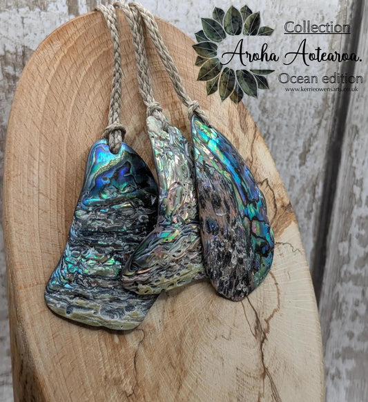 New Zealand free form naturally tumbled Pāua shell pendant.