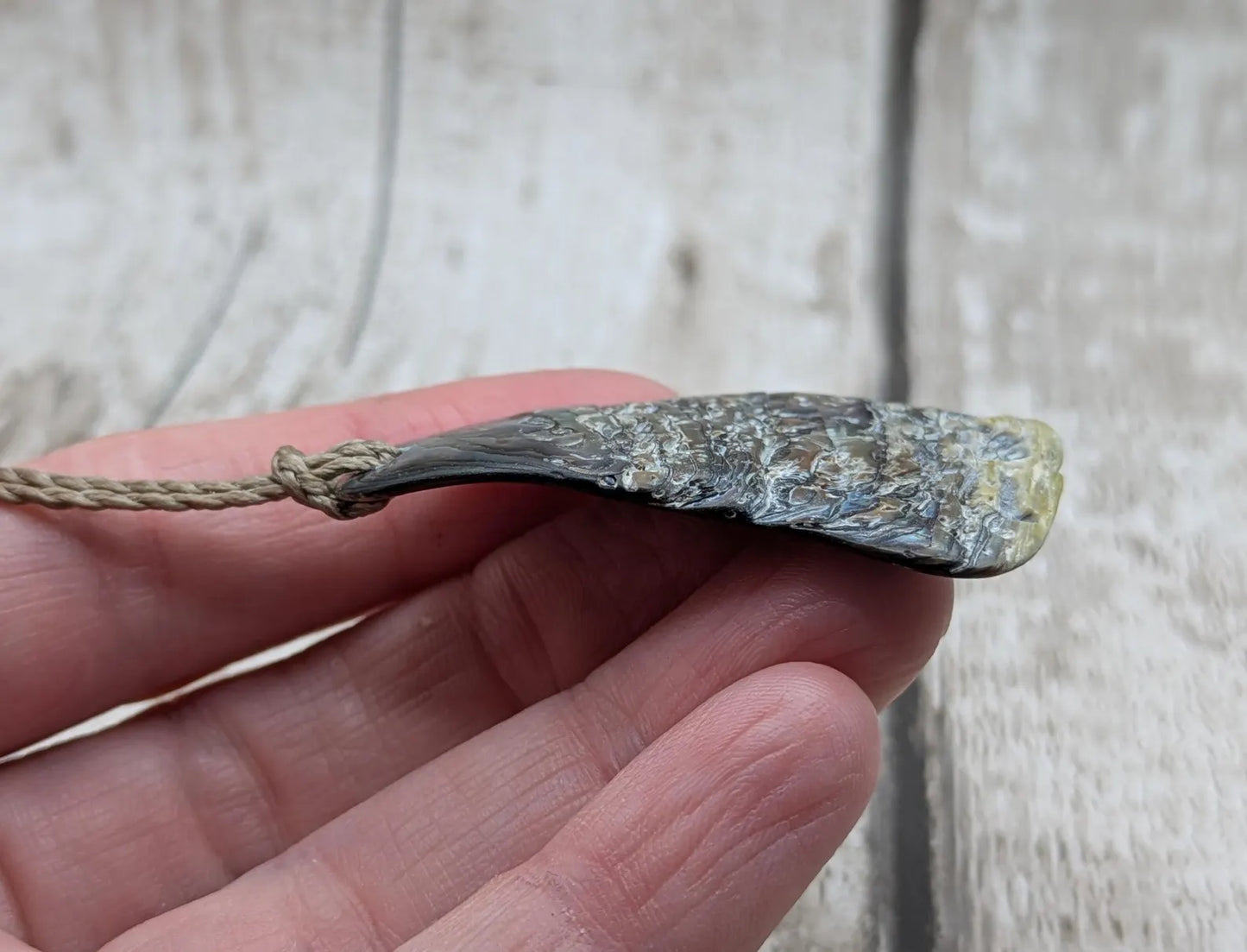 New Zealand free form naturally tumbled Pāua shell pendant.
