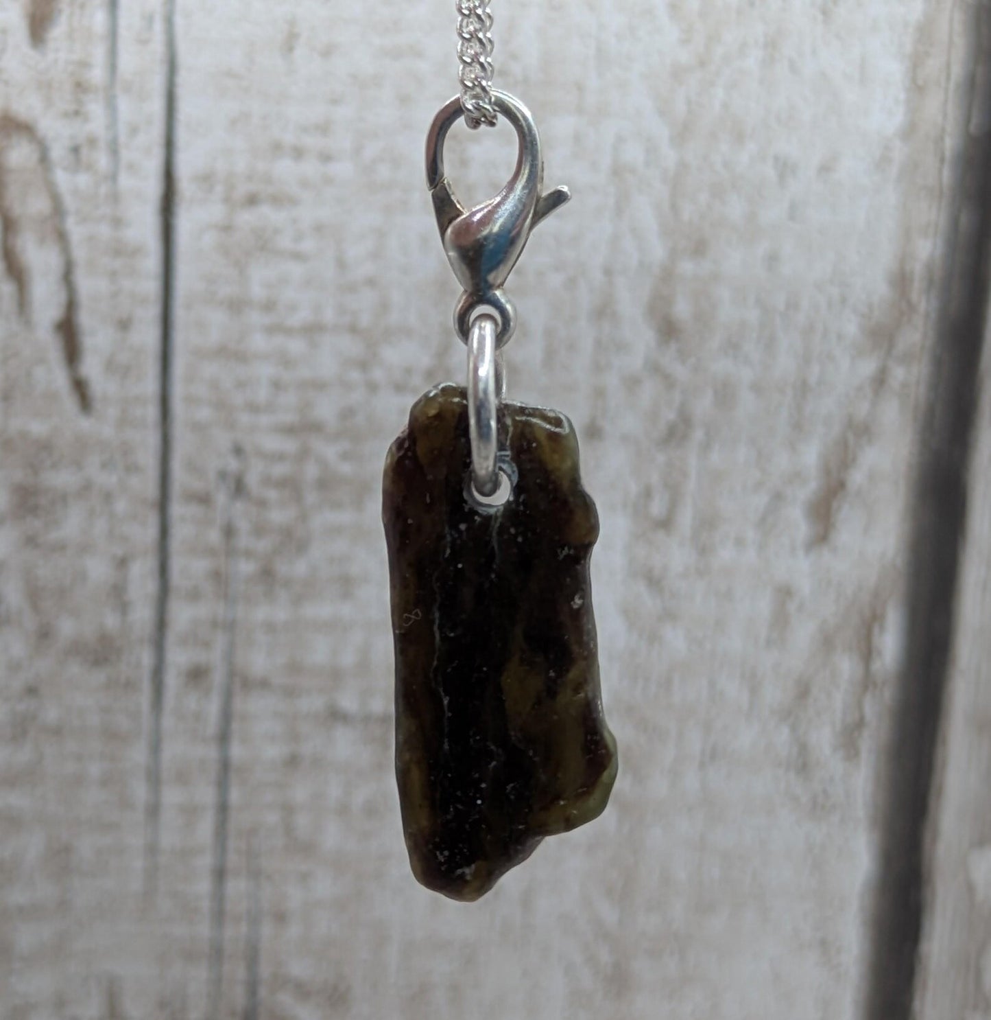 Tumbled New Zealand Pounamu greenstone jade clip on jewellery charm.