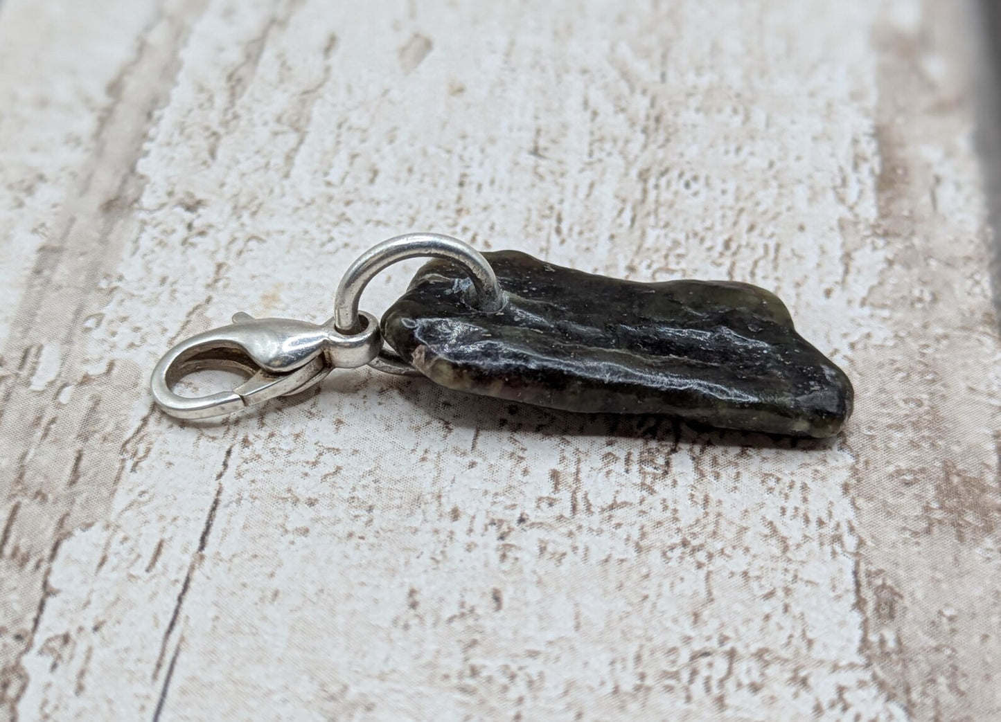 Tumbled New Zealand Pounamu greenstone jade clip on jewellery charm.