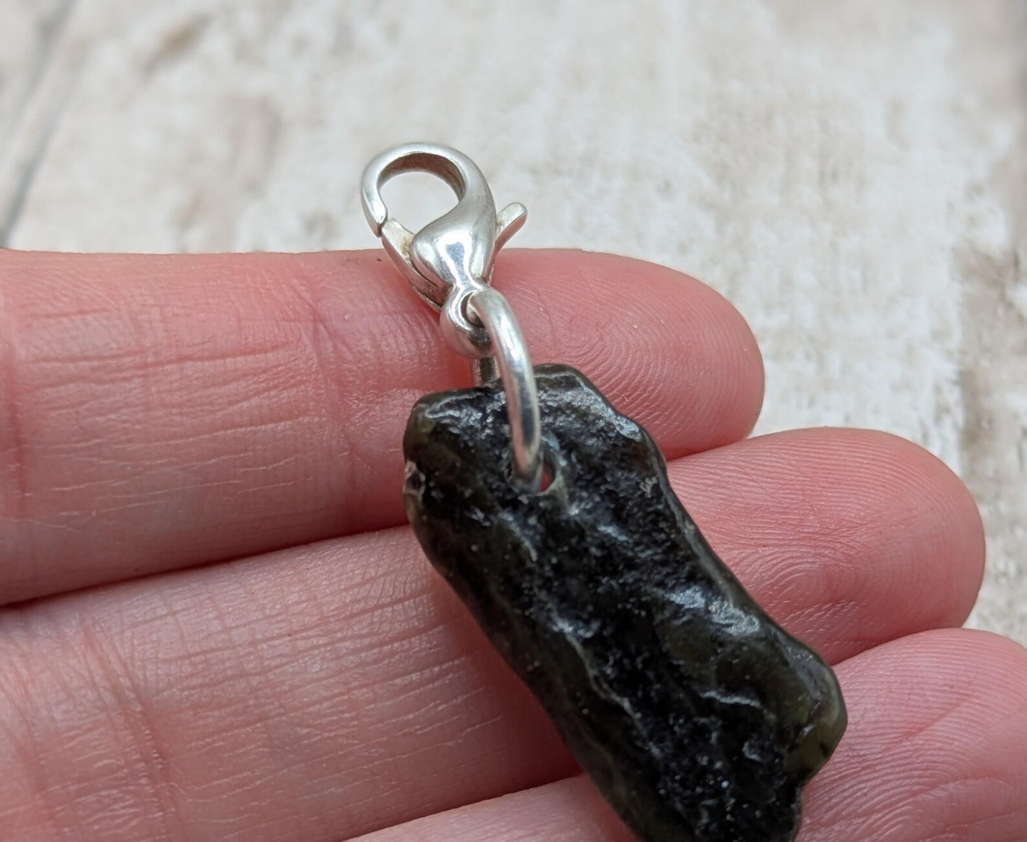 Tumbled New Zealand Pounamu greenstone jade clip on jewellery charm.