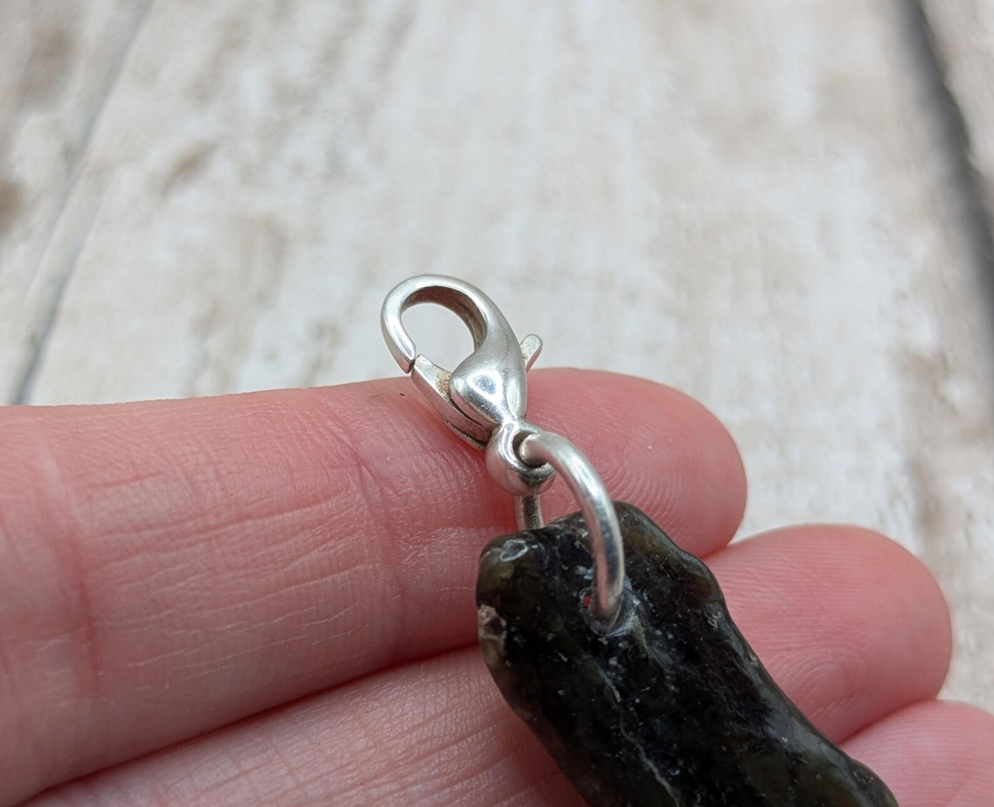 Tumbled New Zealand Pounamu greenstone jade clip on jewellery charm.