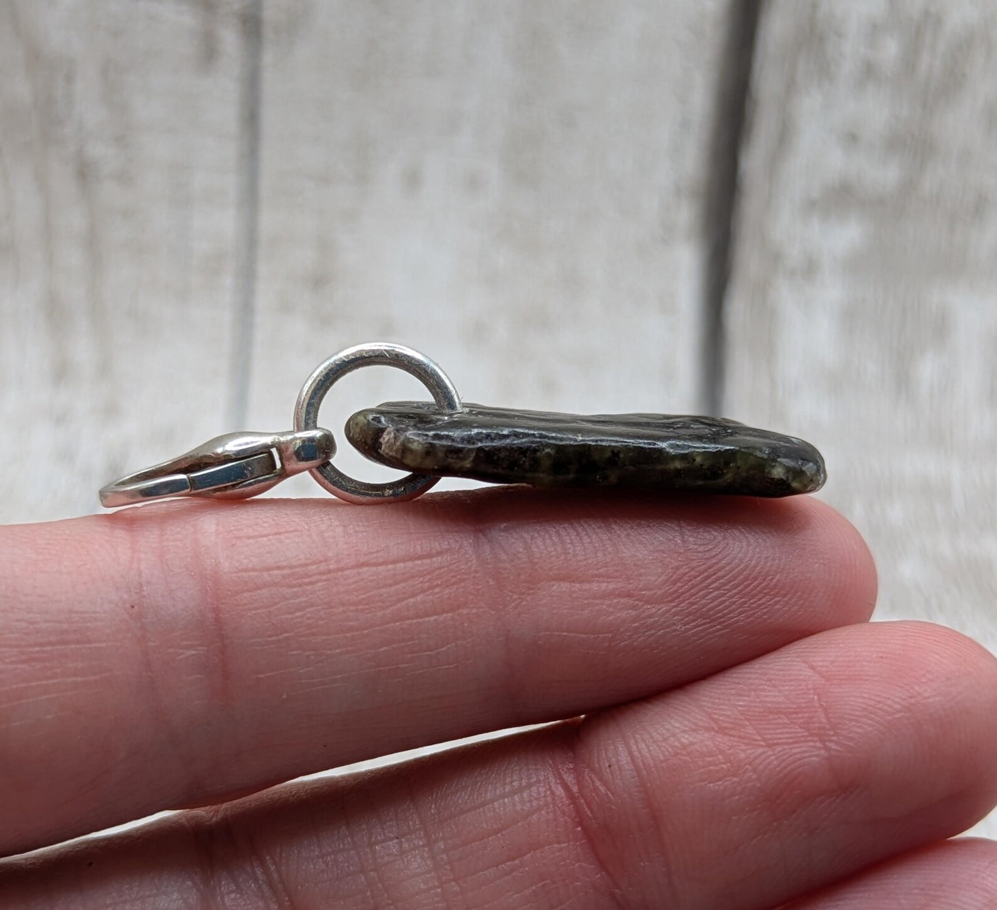 Tumbled New Zealand Pounamu greenstone jade clip on jewellery charm.