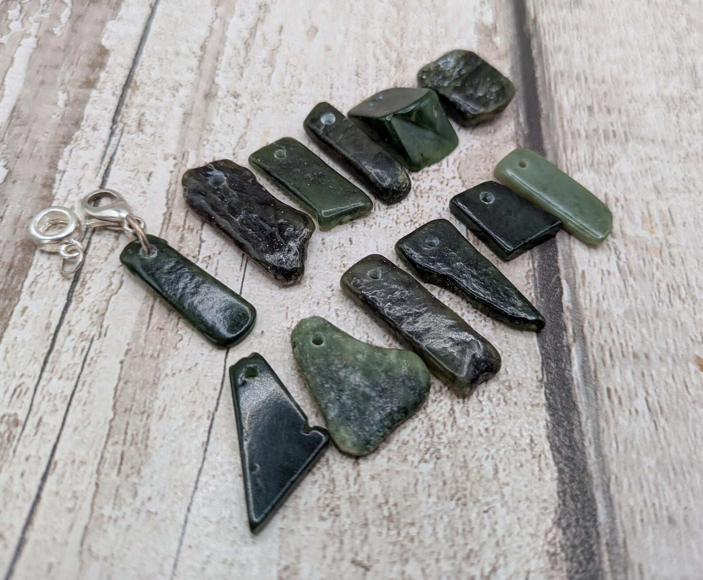 Tumbled New Zealand Pounamu greenstone jade clip on jewellery charm.