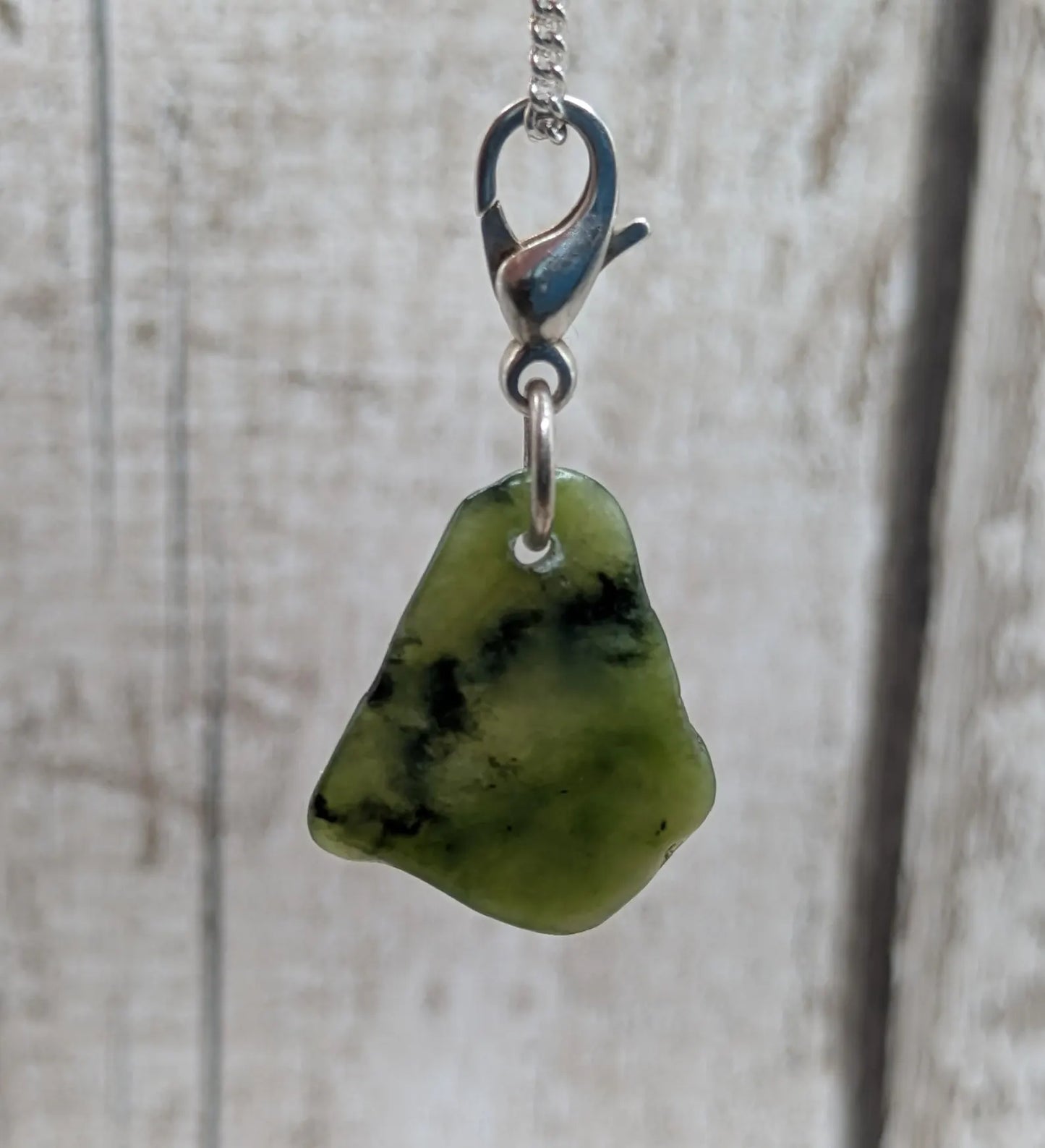 Tumbled New Zealand Pounamu greenstone jade clip on charm.