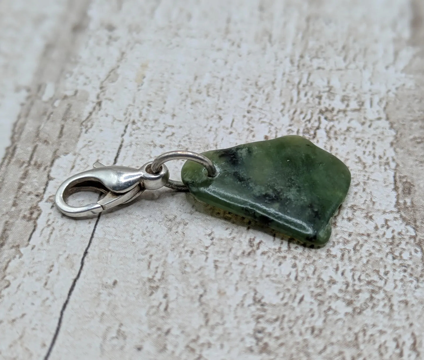 Tumbled New Zealand Pounamu greenstone jade clip on charm.