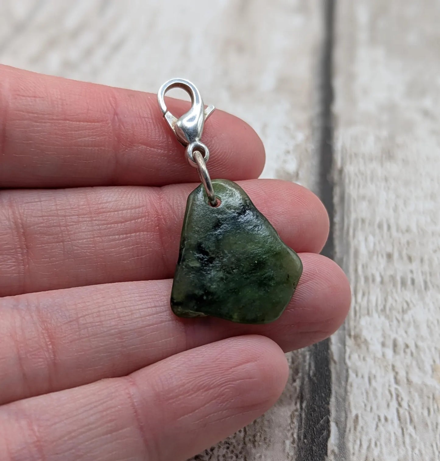 Tumbled New Zealand Pounamu greenstone jade clip on charm.