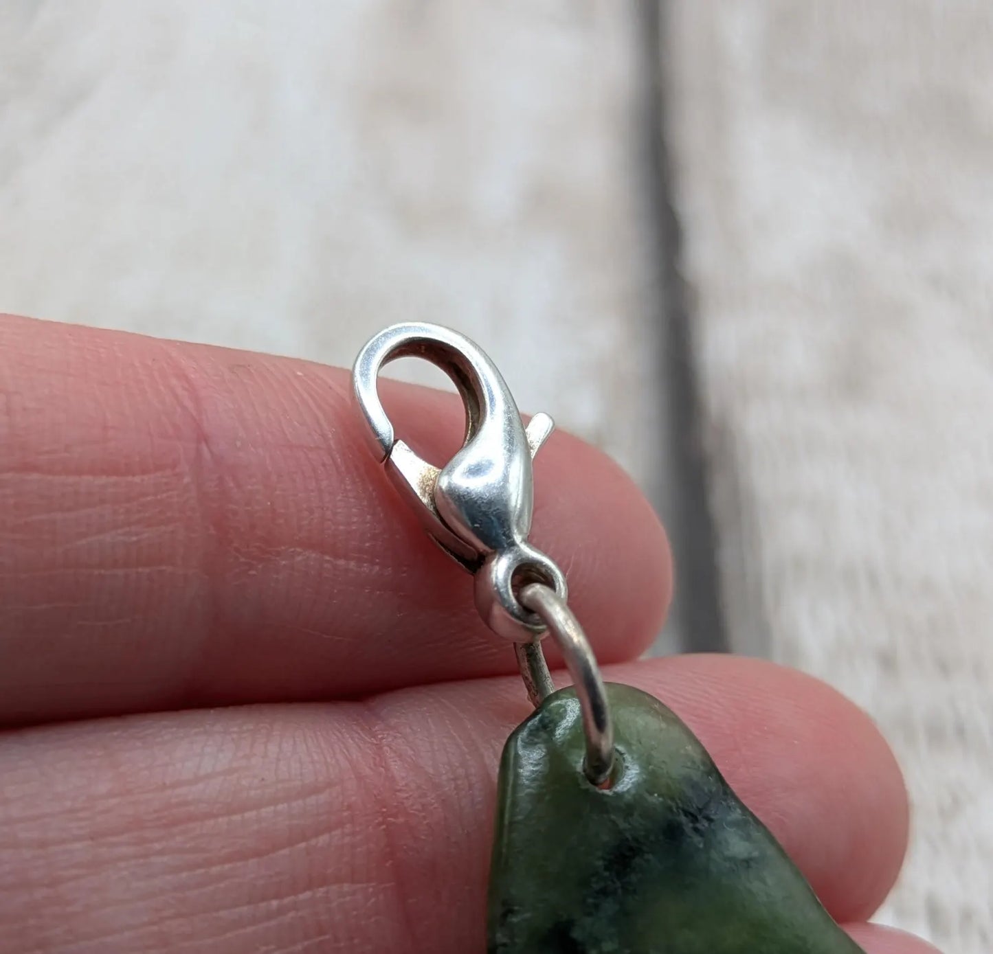 Tumbled New Zealand Pounamu greenstone jade clip on charm.