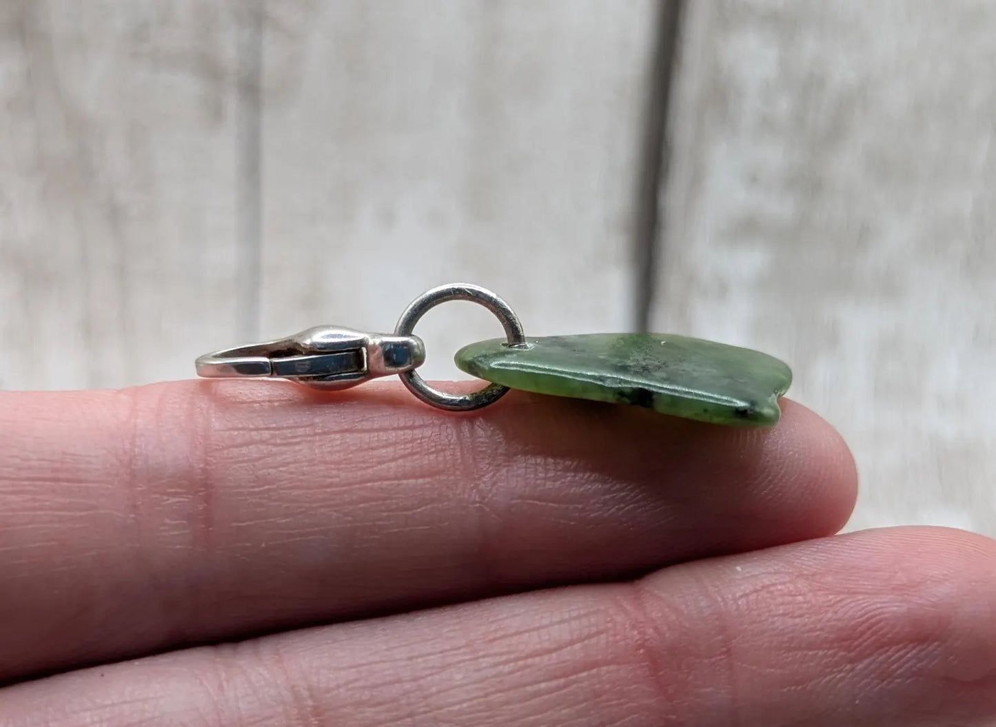 Tumbled New Zealand Pounamu greenstone jade clip on charm.