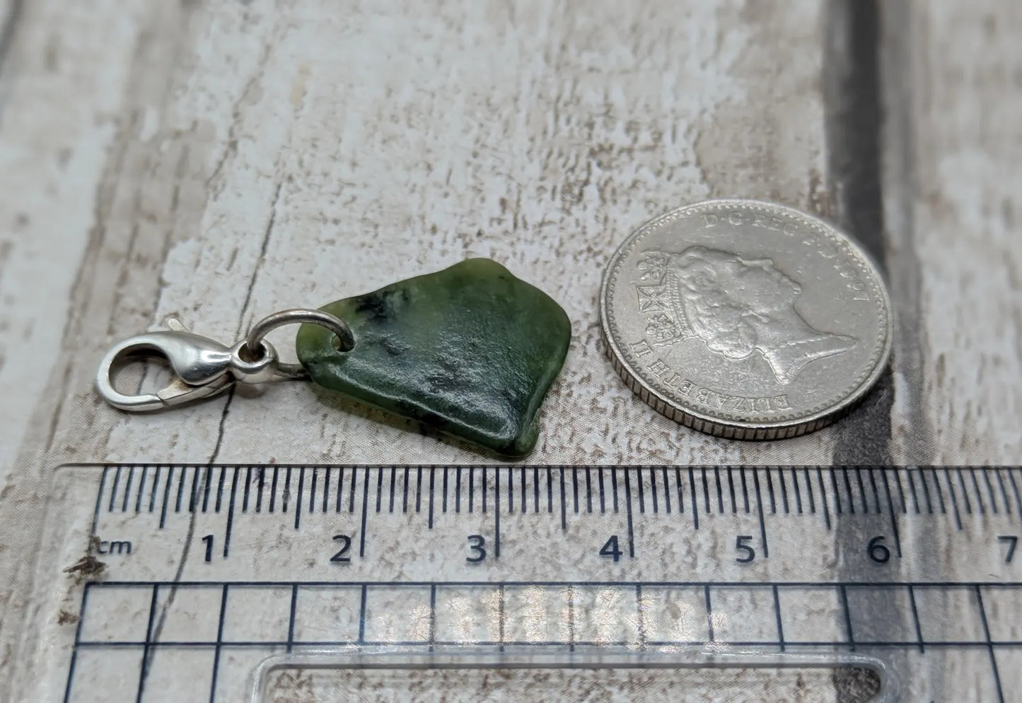 Tumbled New Zealand Pounamu greenstone jade clip on charm.