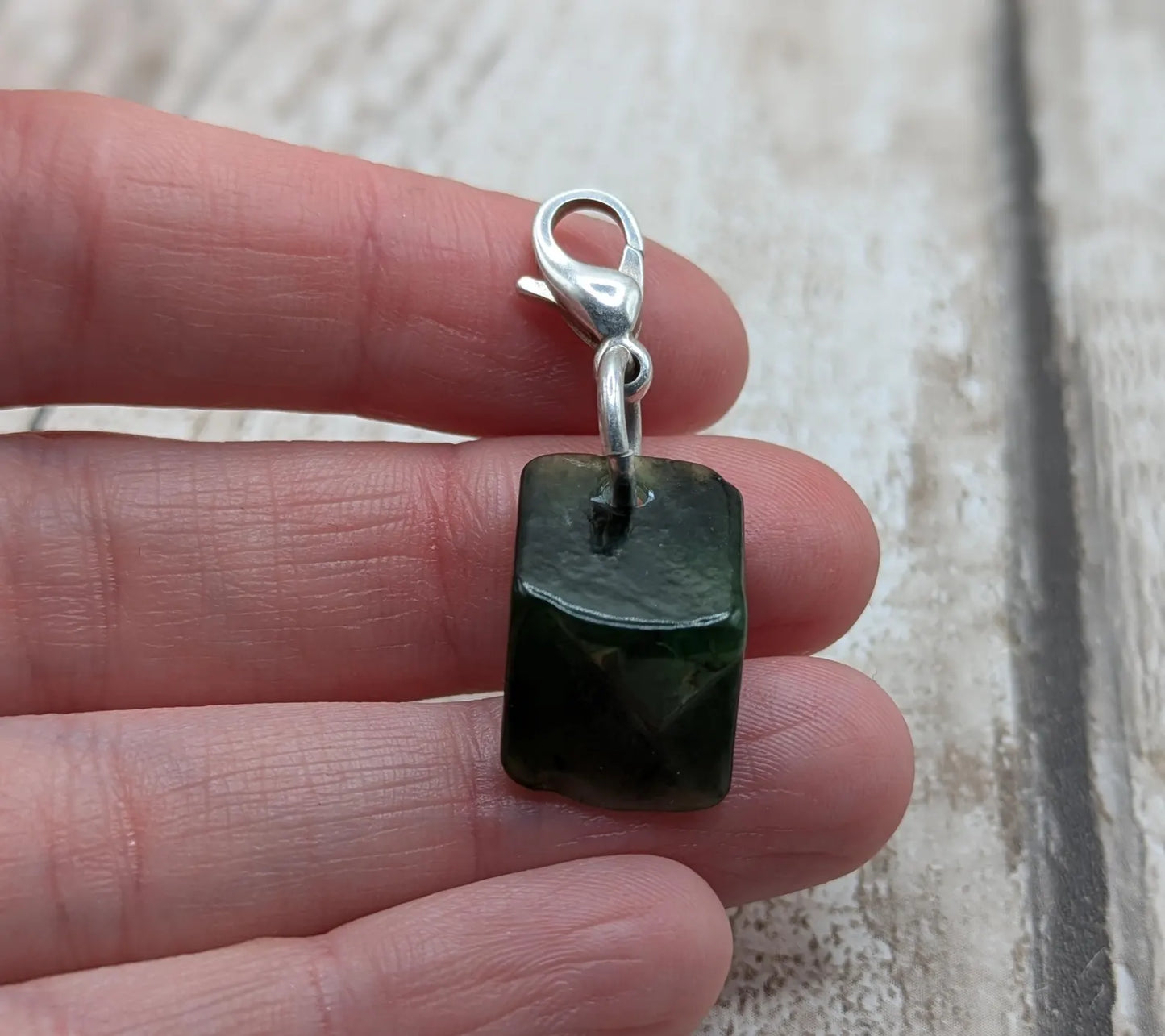 Tumbled New Zealand Pounamu greenstone jade clip on jewellery charm.
