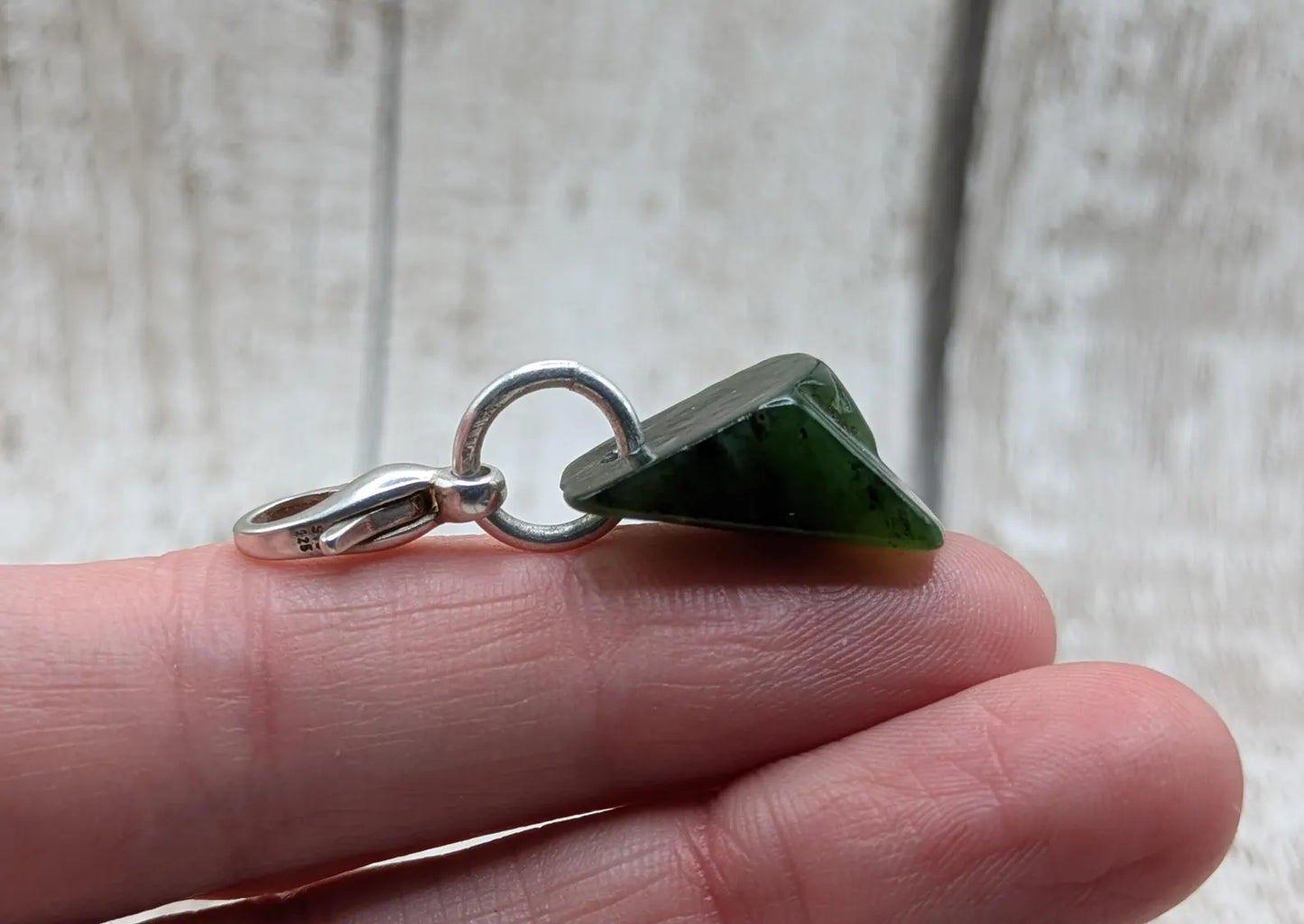 Tumbled New Zealand Pounamu greenstone jade clip on jewellery charm.