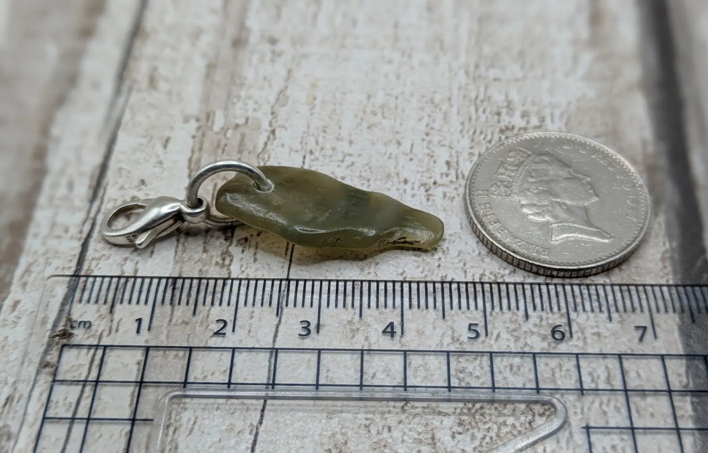 Tumbled New Zealand Pounamu greenstone jade clip on jewellery charm.