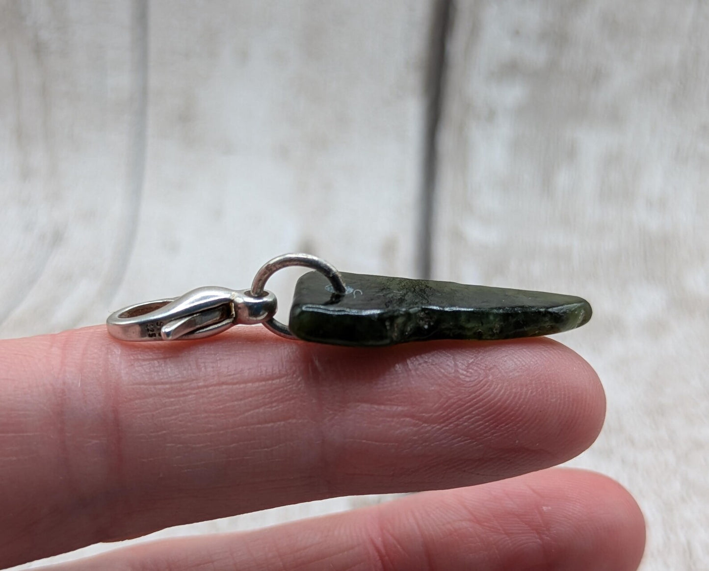 Tumbled New Zealand Pounamu greenstone jade clip on charm.