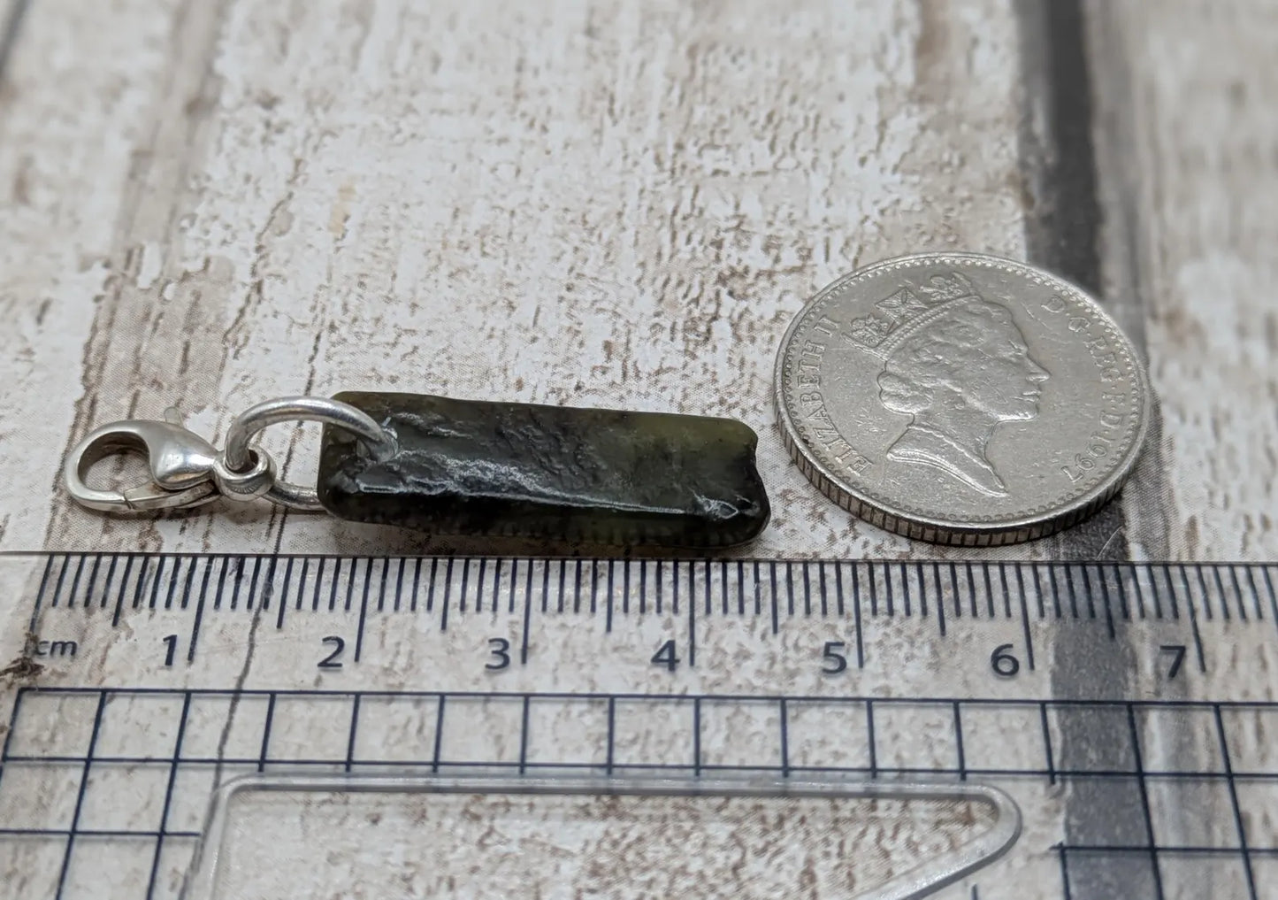 Tumbled New Zealand Pounamu greenstone jade clip on jewellery charm.