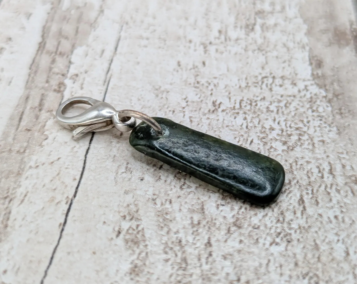 Tumbled New Zealand Pounamu jade clip on jewellery charm.
