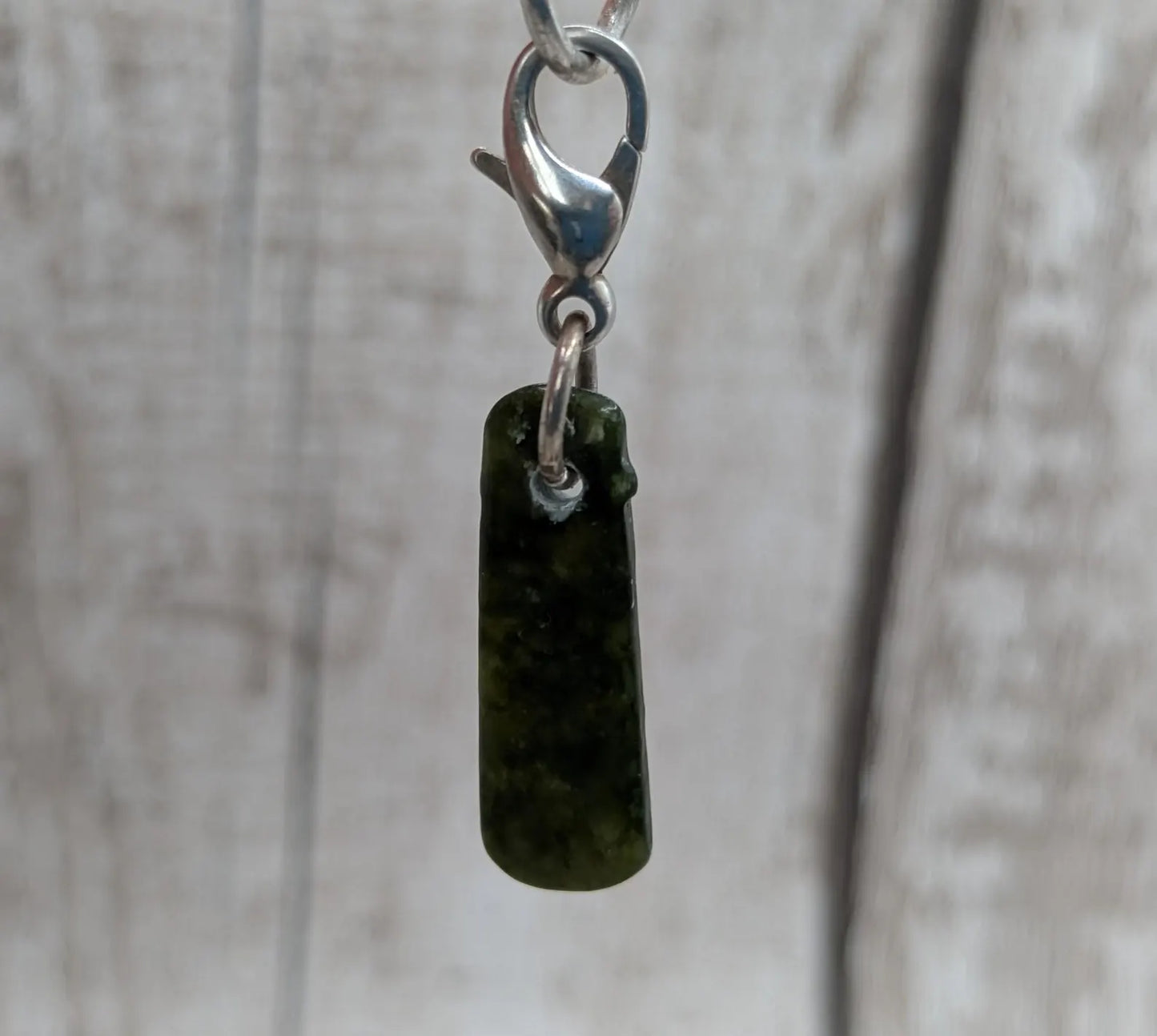 Tumbled New Zealand Pounamu jade clip on jewellery charm.