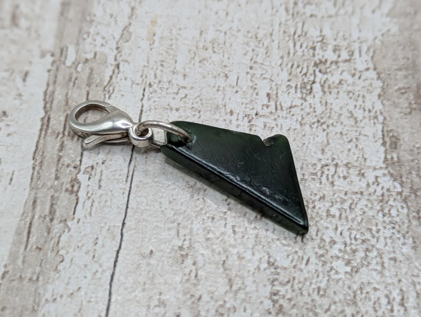 Tumbled New Zealand Pounamu greenstone jade clip on jewellery charm.
