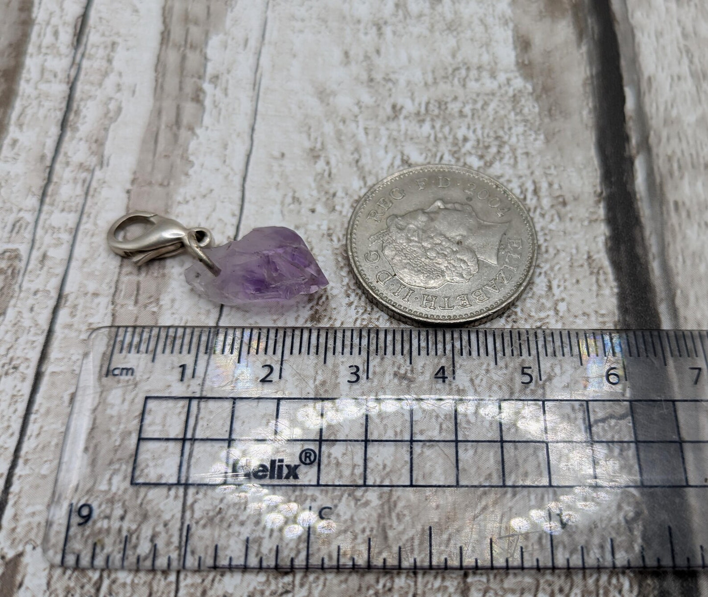 Amethyst raw point clip on charm.