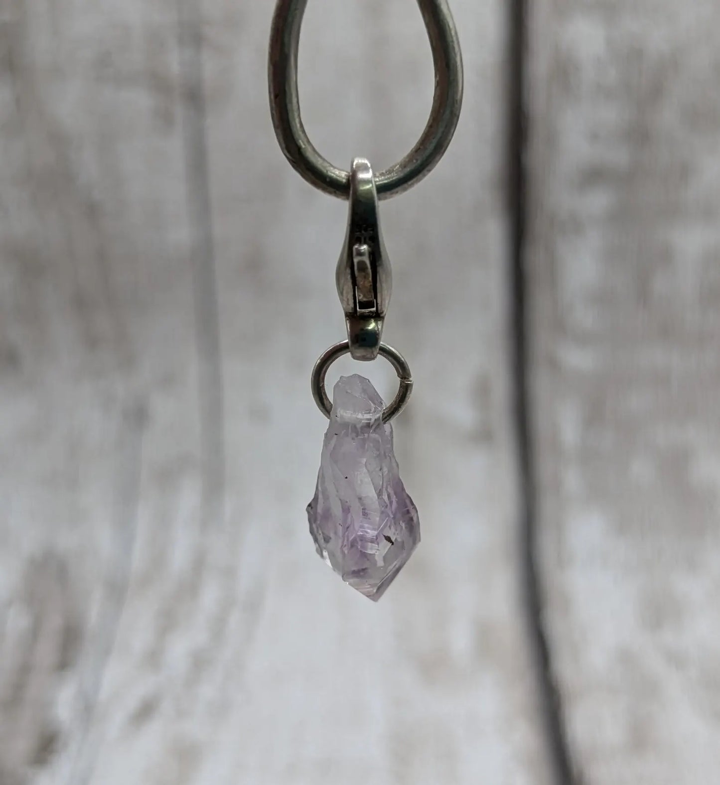 Amethyst raw point clip on charm.