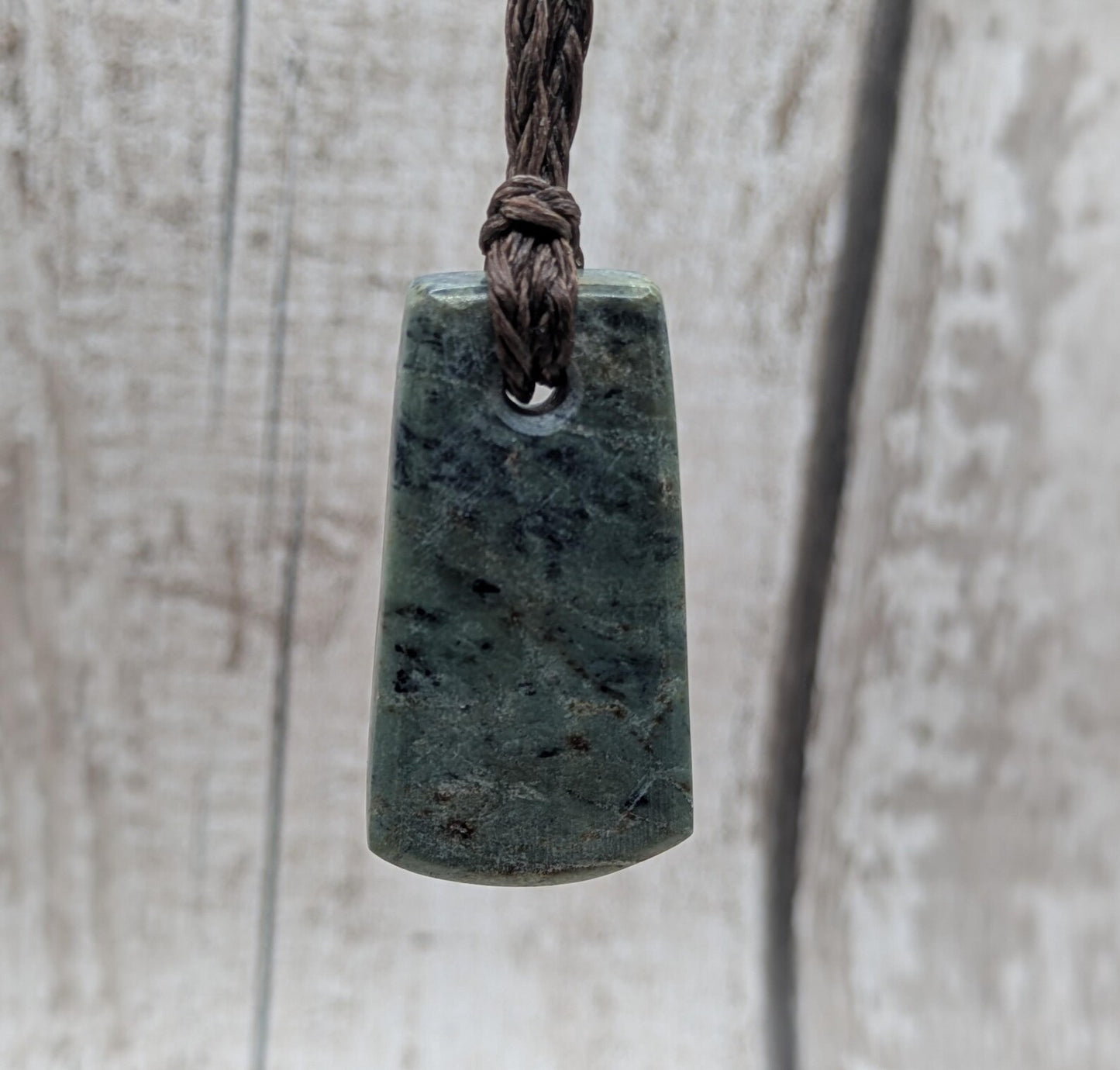 new Zealand pounamu greenstone jade pendant Off cut slice, raw weathered back, cultural and spiritual amulet.