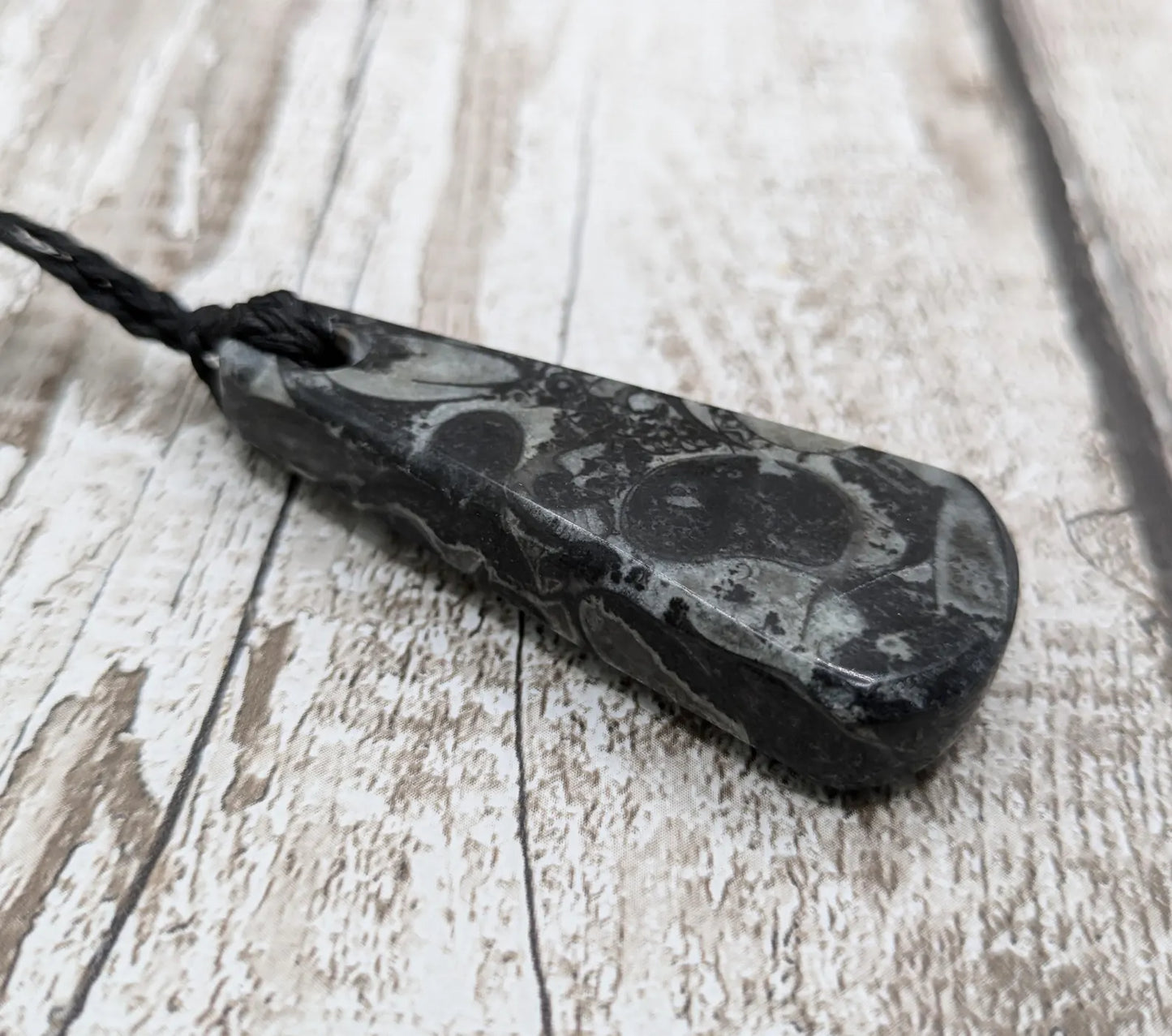 Fossil marble bedrock roimata pendant.