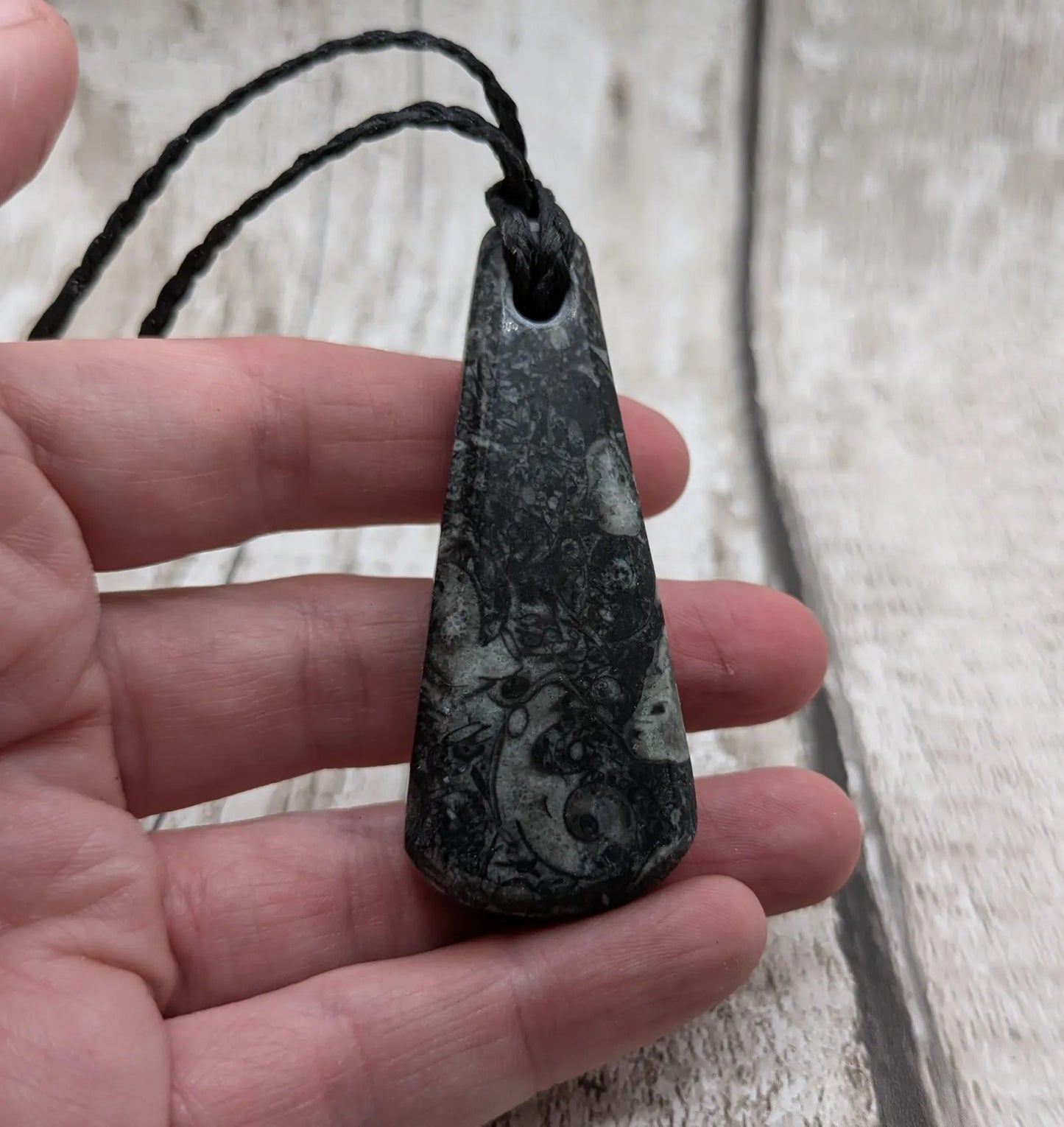 Fossil marble bedrock roimata pendant.