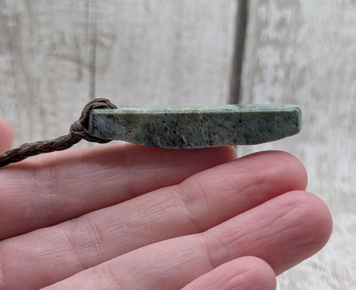 One Raw back Pounamu Jade Pendant – Natural New Zealand Greenstone Offcut, Polished Sides, Affordable Spiritual and cultural Jewellery.