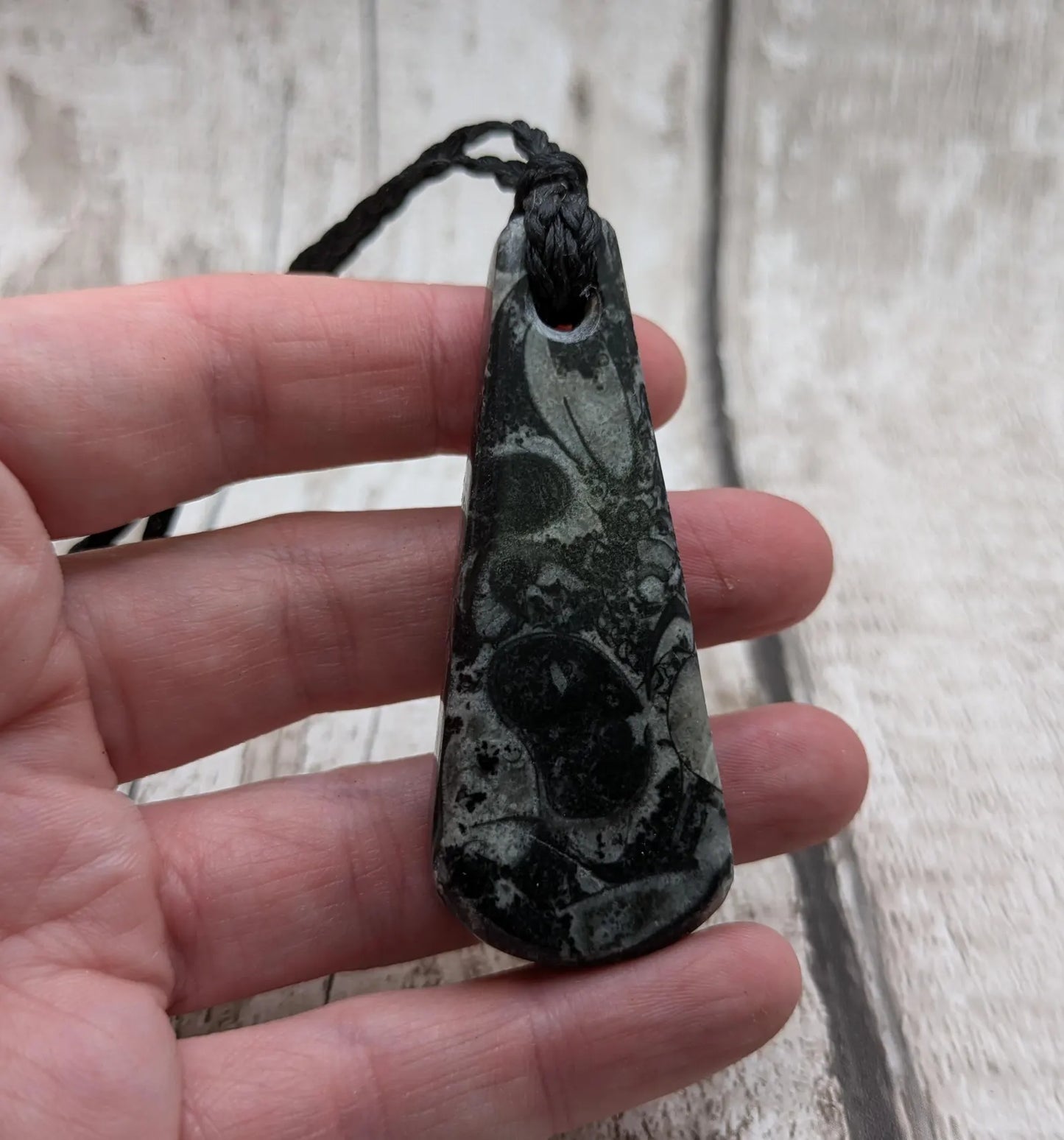 Fossil marble bedrock roimata pendant.