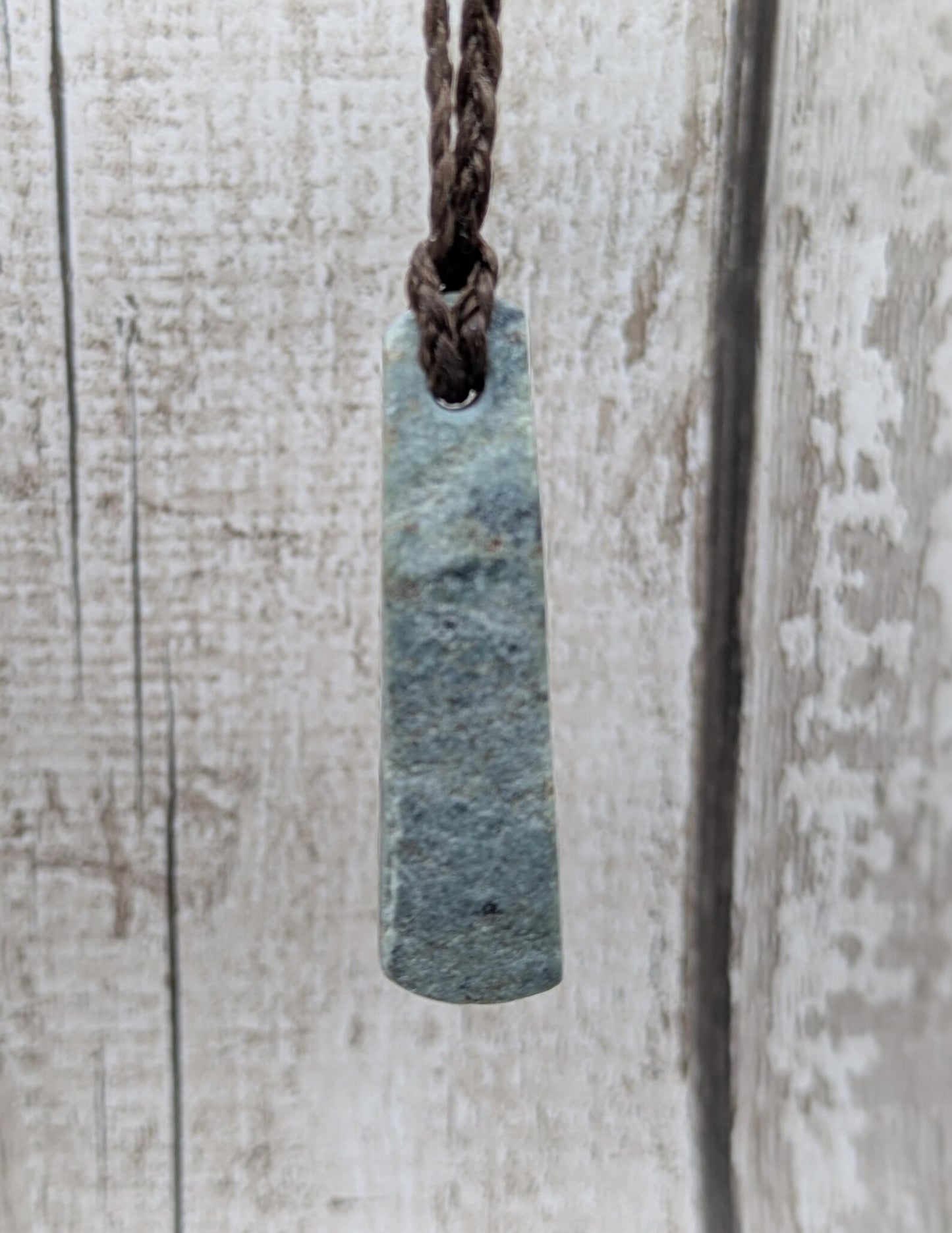 One Raw back Pounamu Jade Pendant – Natural New Zealand Greenstone Offcut, Polished Sides, Affordable Spiritual and cultural Jewellery.