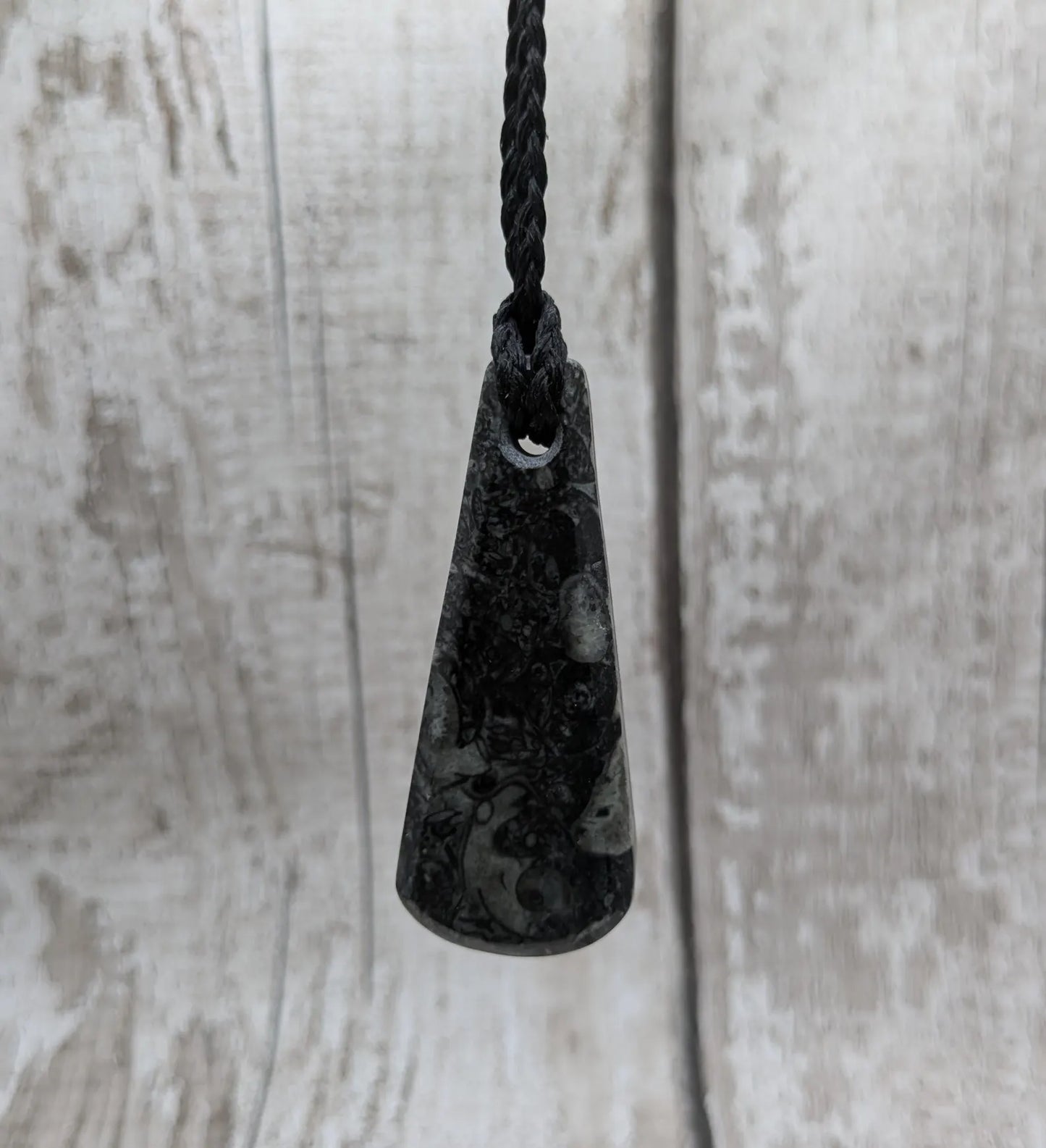 Fossil marble bedrock roimata pendant.