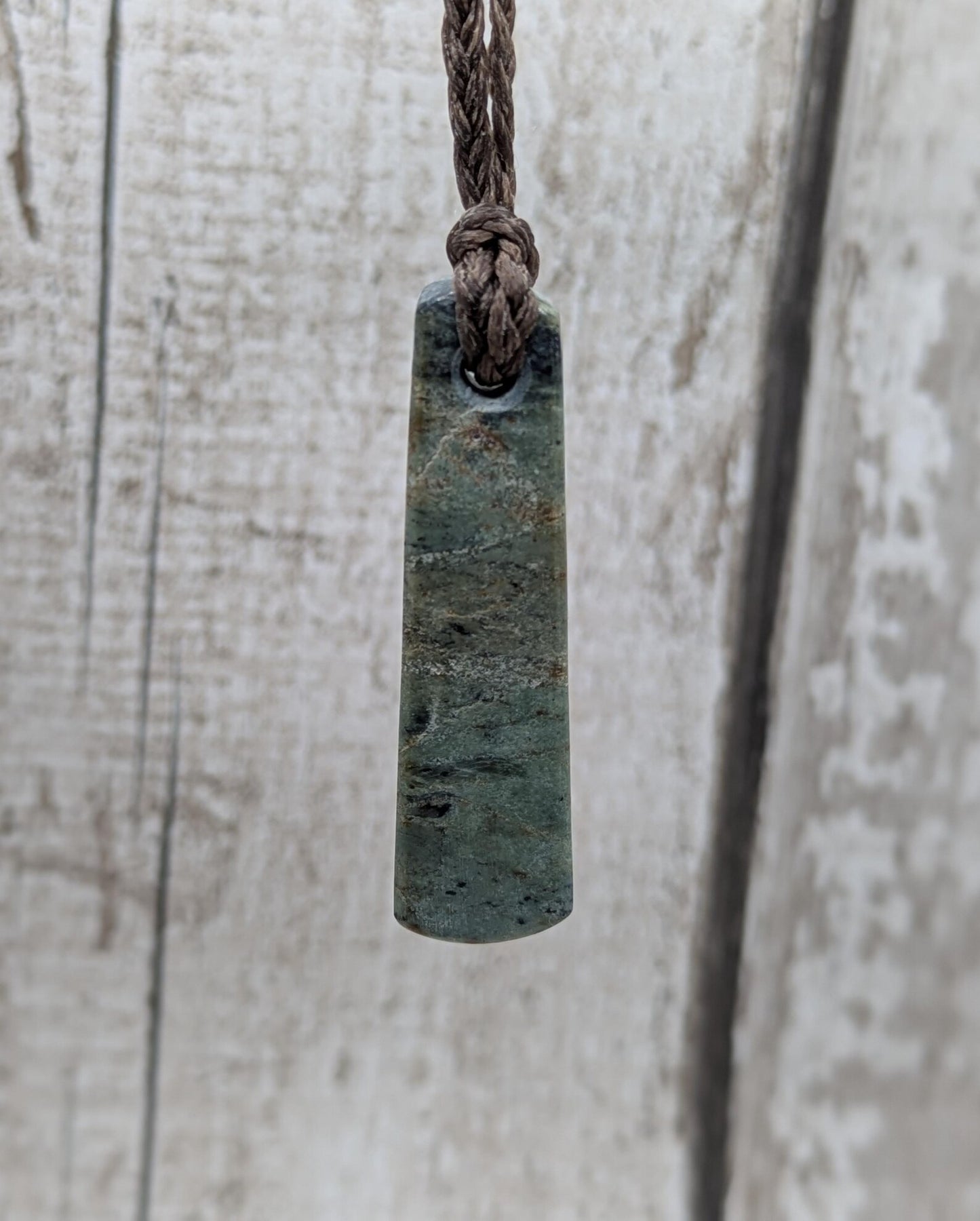 One Raw back Pounamu Jade Pendant – Natural New Zealand Greenstone Offcut, Polished Sides, Affordable Spiritual and cultural Jewellery.