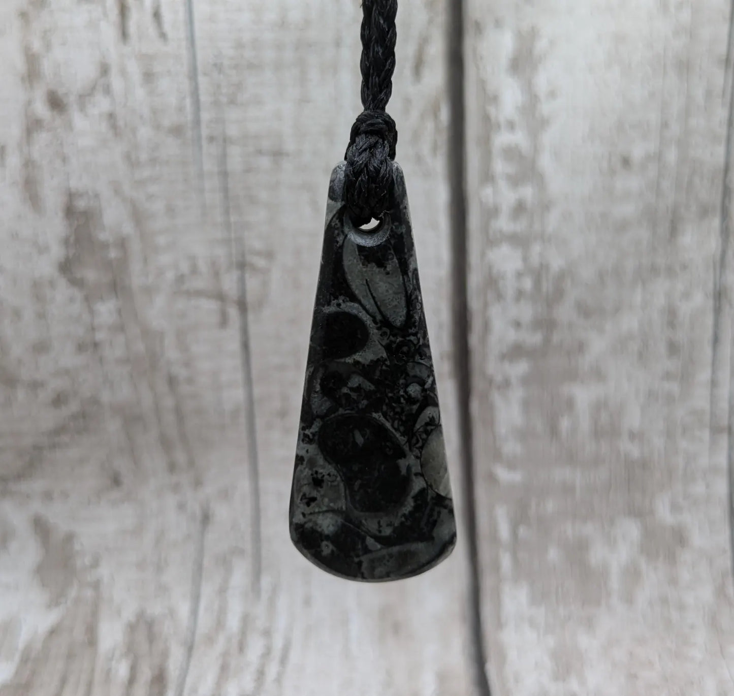 Fossil marble bedrock roimata pendant.