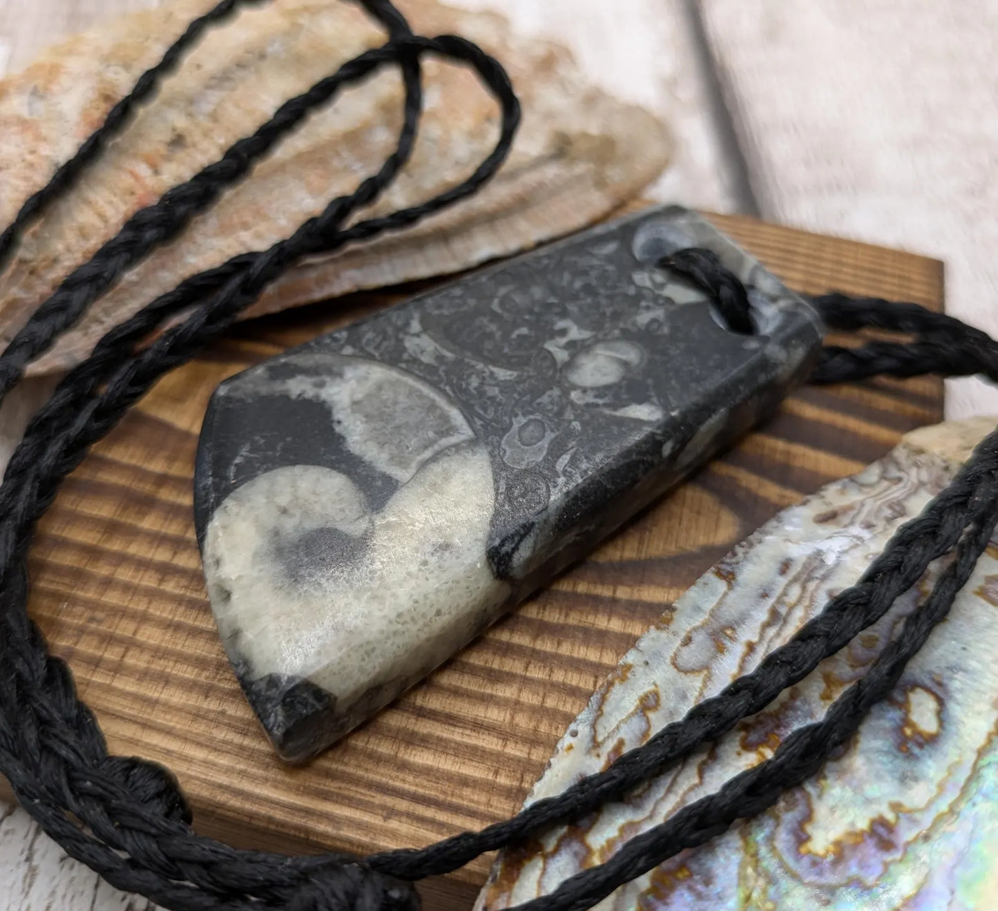 Fossil bedrock marble Toki style pendant.