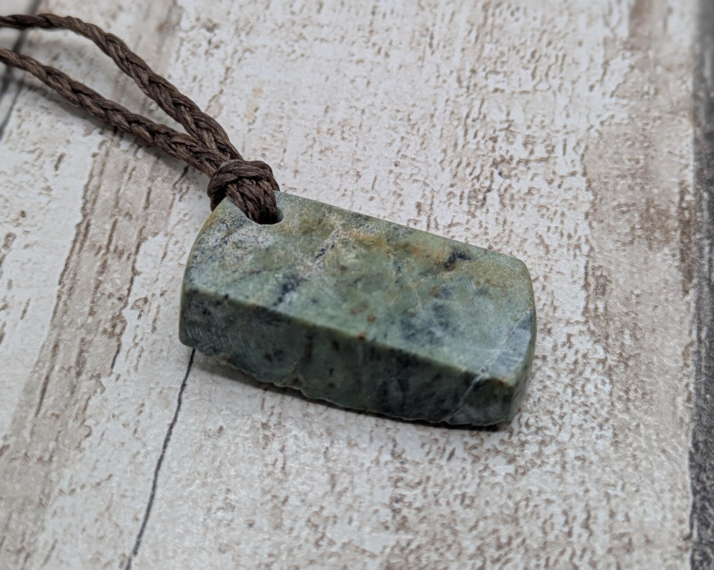 Raw back Pounamu Jade Pendant – Natural New Zealand Greenstone Offcut, Polished Sides, Affordable Spiritual and cultural Jewellery.