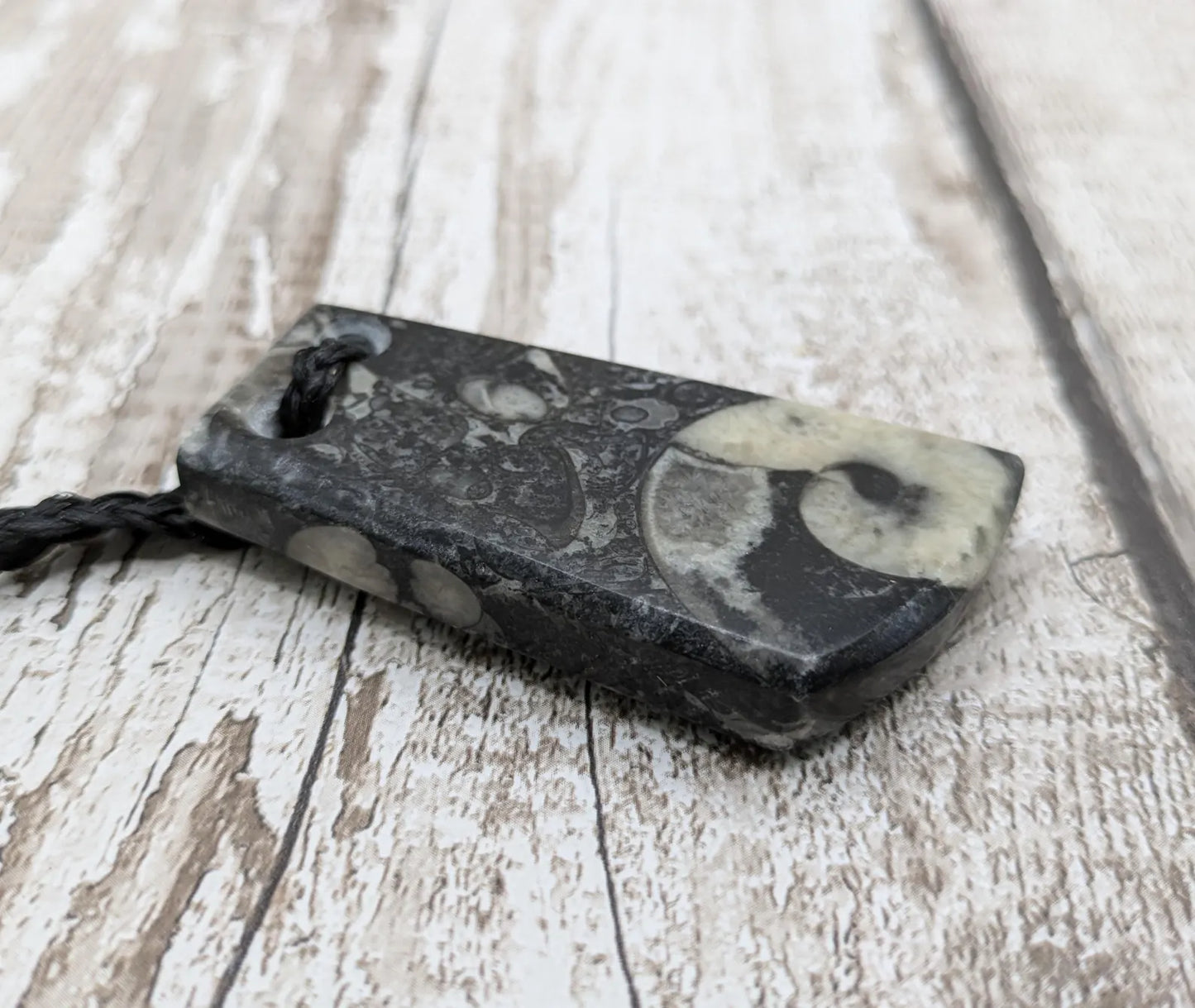 Fossil bedrock marble Toki style pendant.