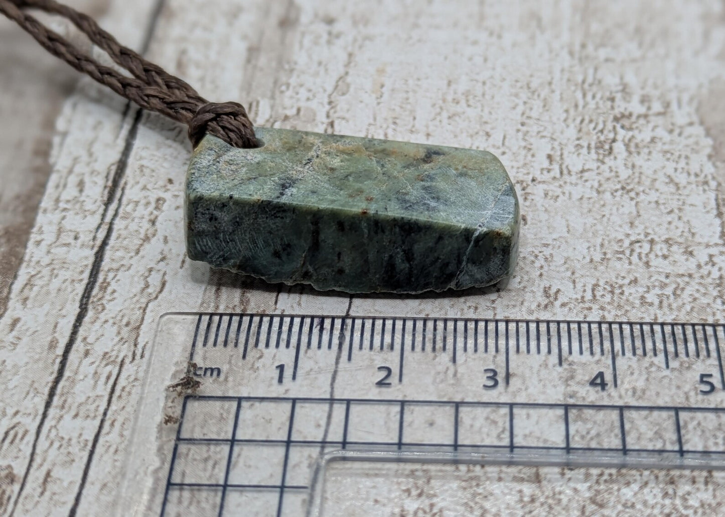 Raw back Pounamu Jade Pendant – Natural New Zealand Greenstone Offcut, Polished Sides, Affordable Spiritual and cultural Jewellery.