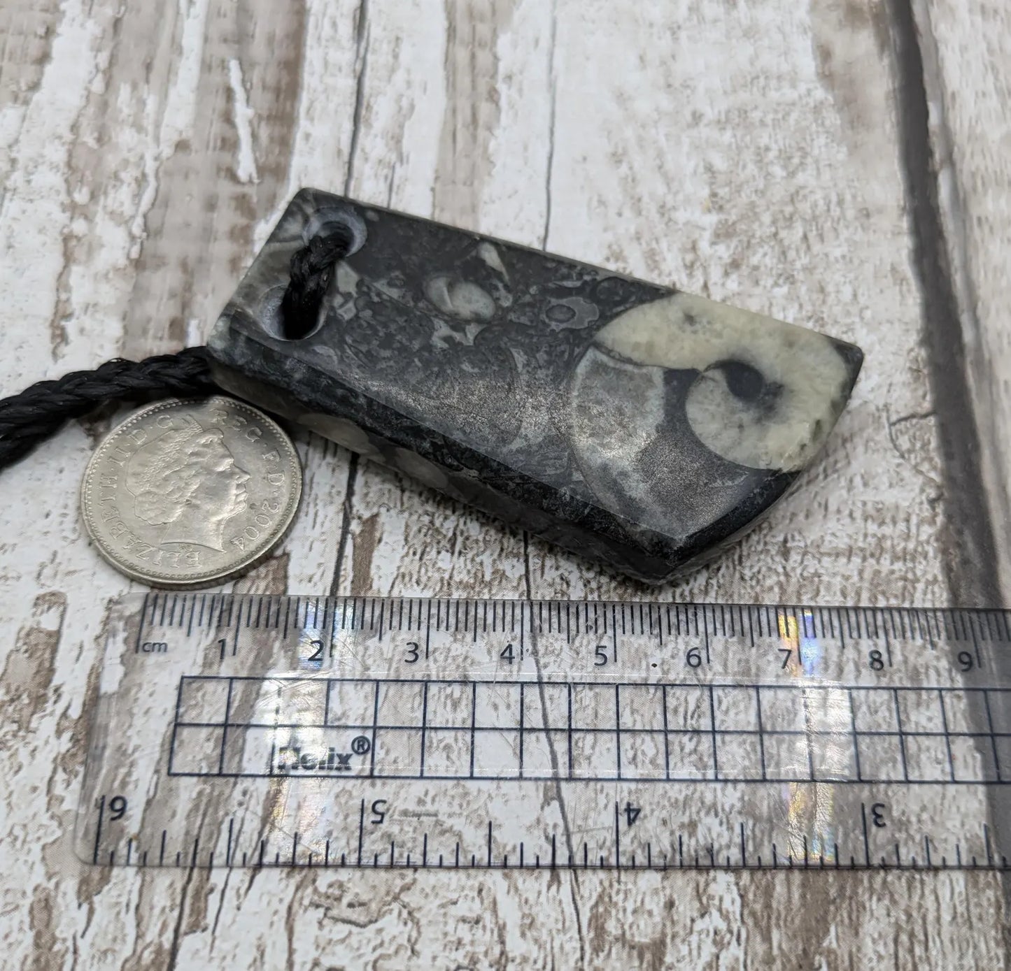 Fossil bedrock marble Toki style pendant.