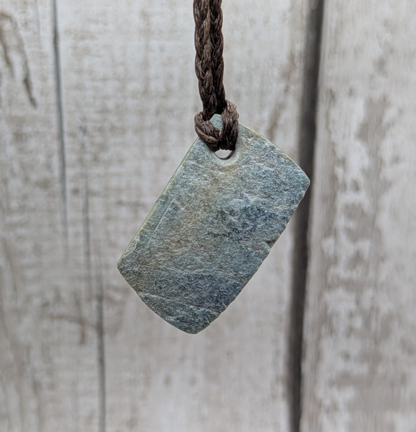 Raw back Pounamu Jade Pendant – Natural New Zealand Greenstone Offcut, Polished Sides, Affordable Spiritual and cultural Jewellery.