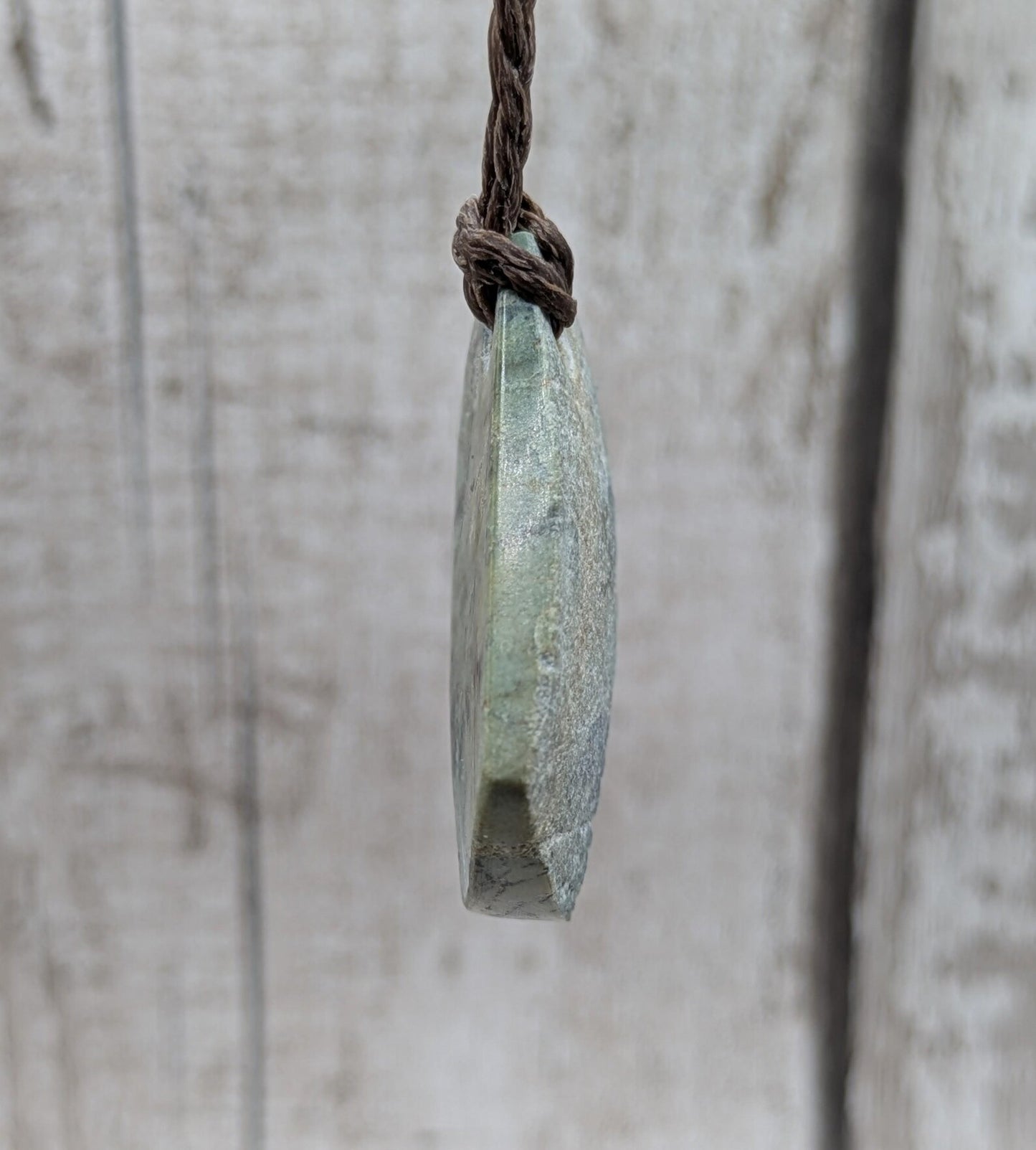 Raw back Pounamu Jade Pendant – Natural New Zealand Greenstone Offcut, Polished Sides, Affordable Spiritual and cultural Jewellery.