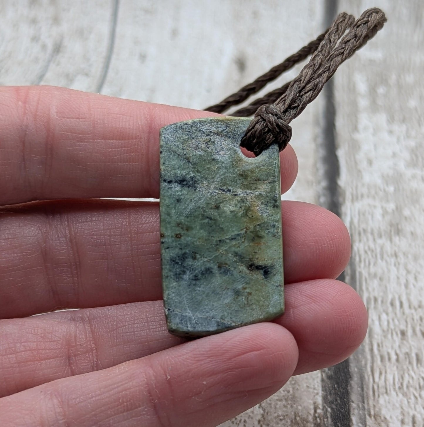 Raw back Pounamu Jade Pendant – Natural New Zealand Greenstone Offcut, Polished Sides, Affordable Spiritual and cultural Jewellery.
