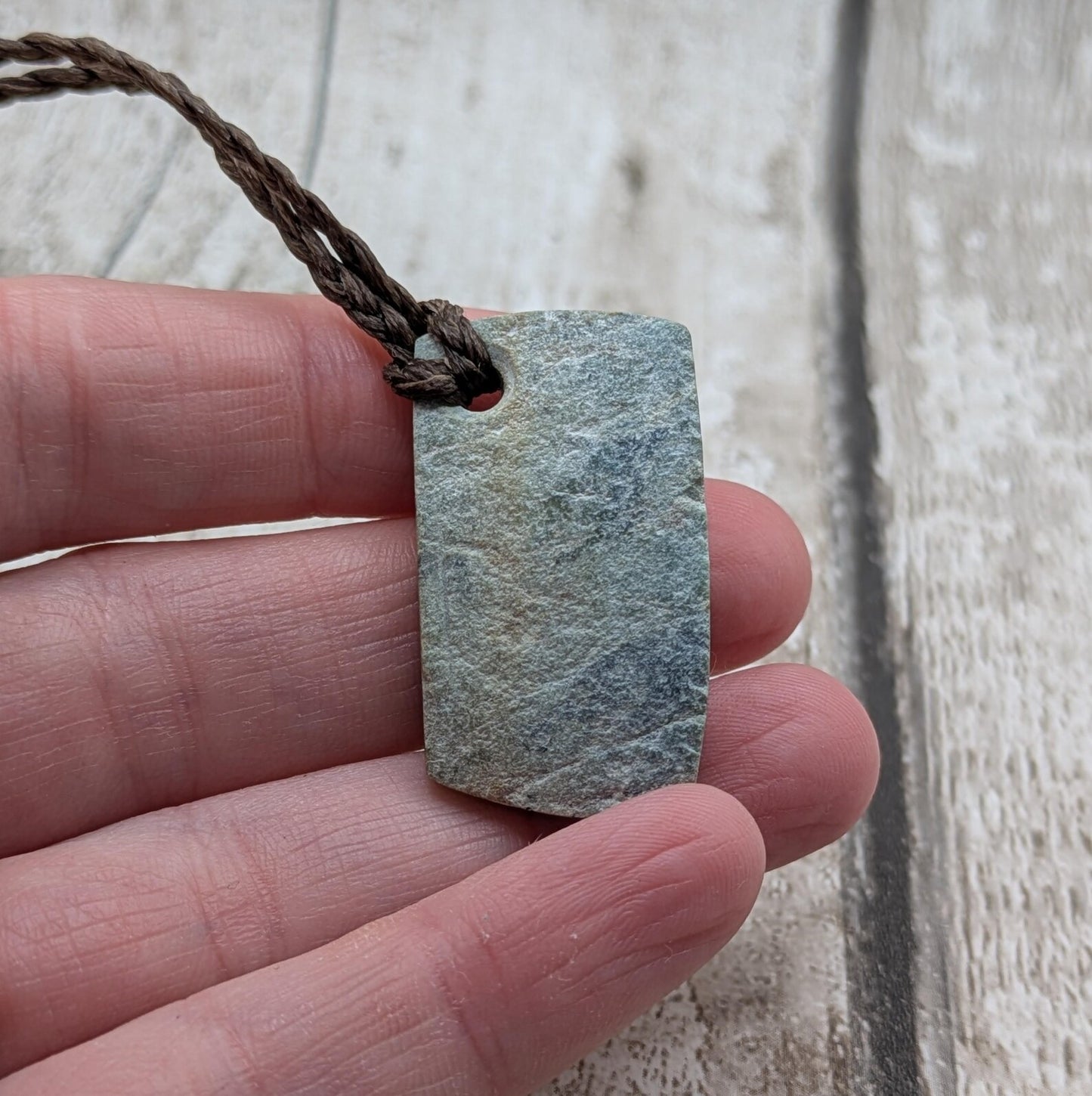 Raw back Pounamu Jade Pendant – Natural New Zealand Greenstone Offcut, Polished Sides, Affordable Spiritual and cultural Jewellery.