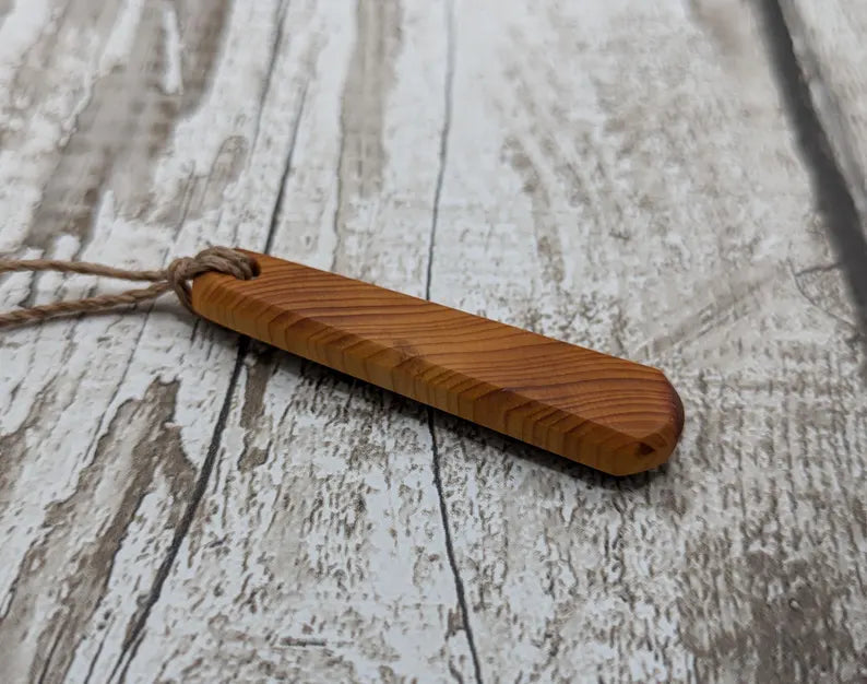 Yew wood roimata pendant.