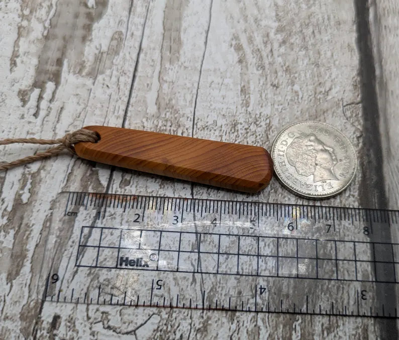 Yew wood roimata pendant.