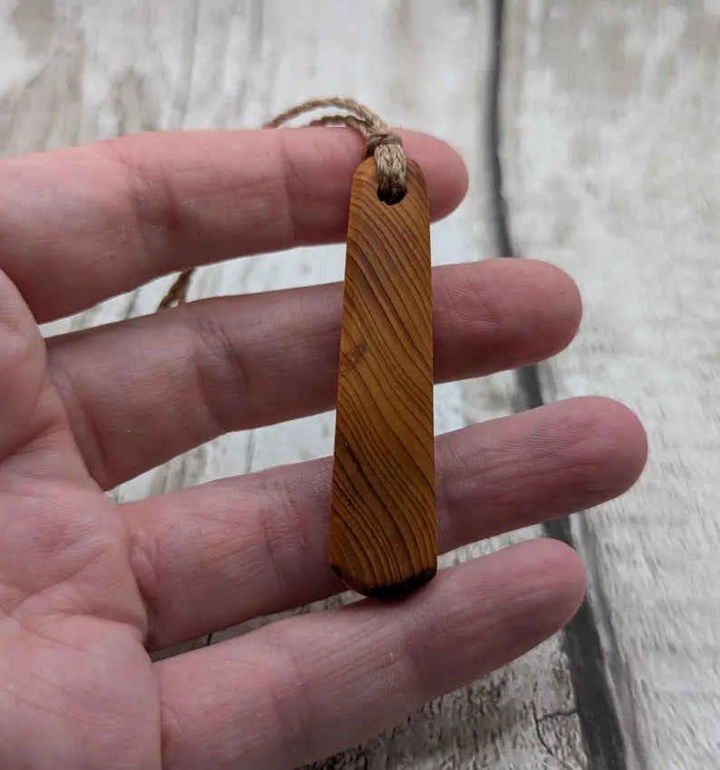 Yew wood roimata pendant.