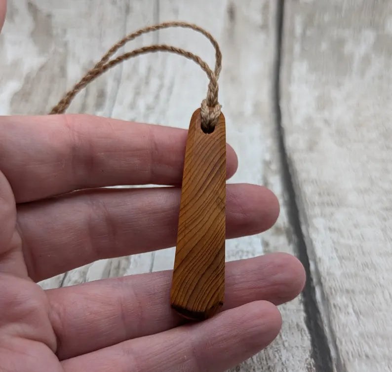 Yew wood roimata pendant.