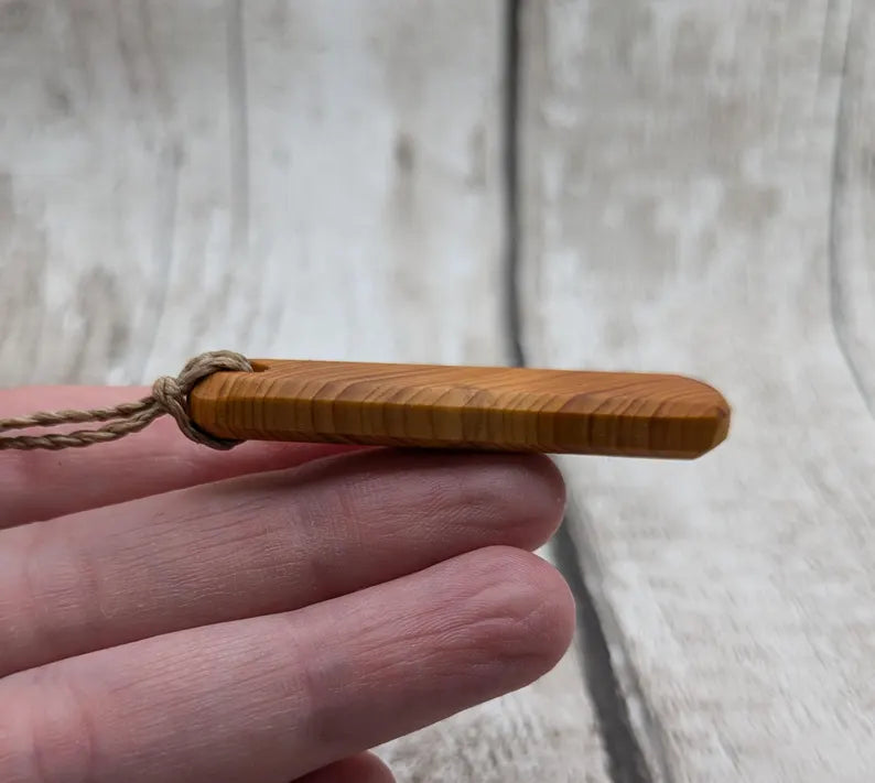 Yew wood roimata pendant.