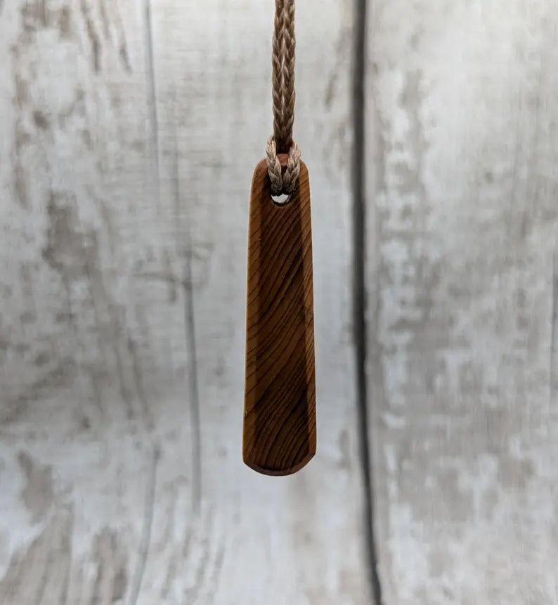 Yew wood roimata pendant.