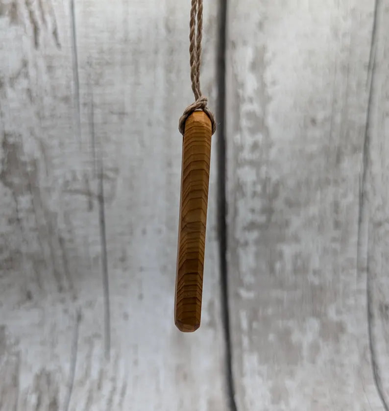 Yew wood roimata pendant.