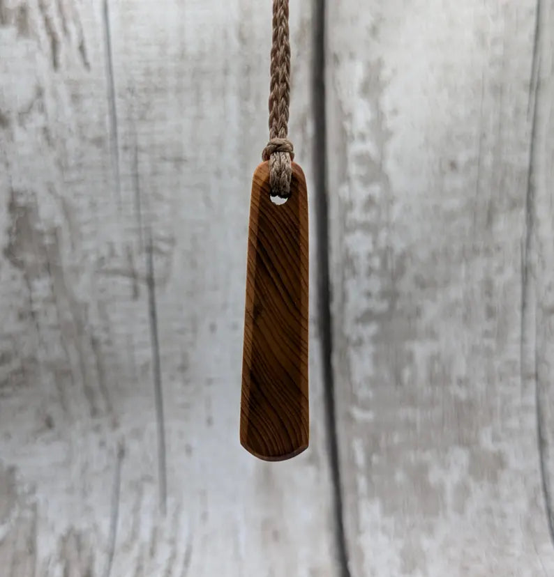 Yew wood roimata pendant.